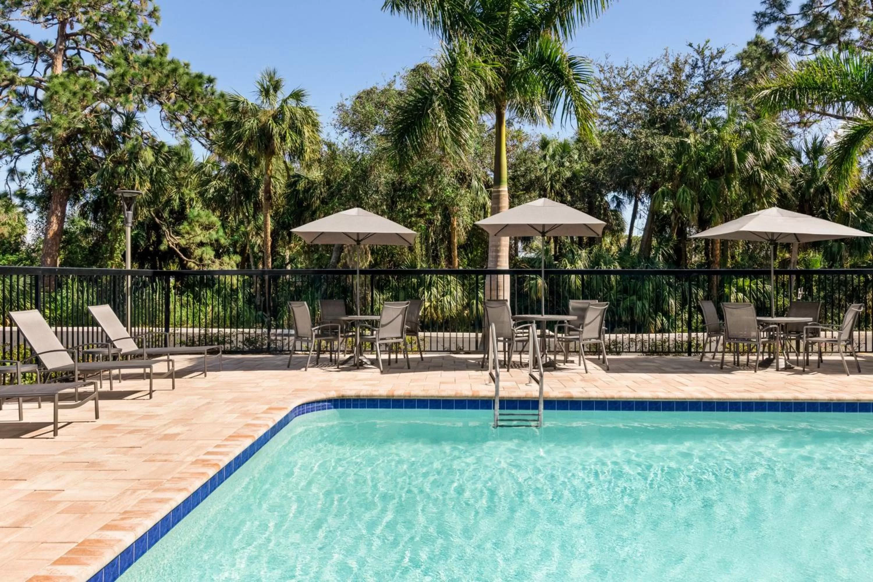 Swimming pool in Fairfield by Marriott Inn & Suites Bonita Springs