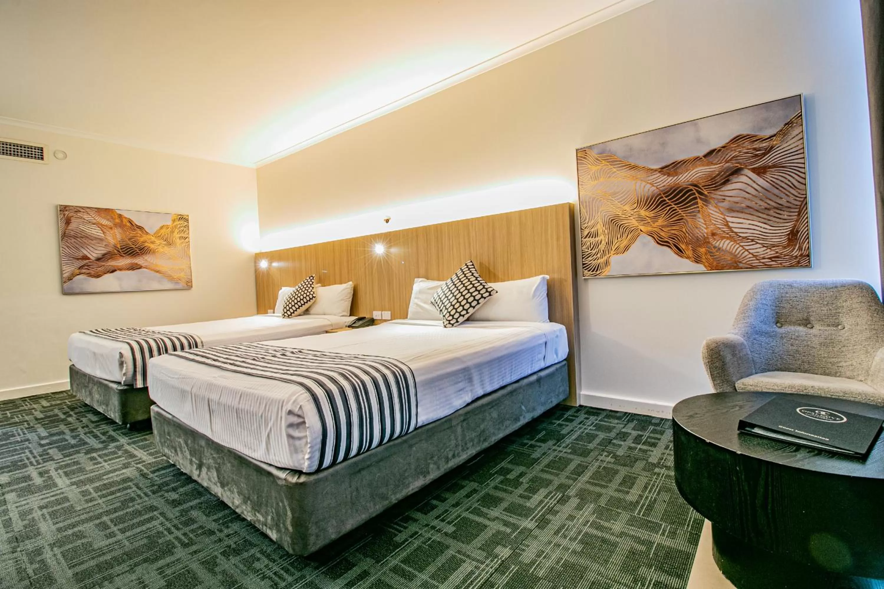 Bed in Absolute Beachfront Opal Cove Resort