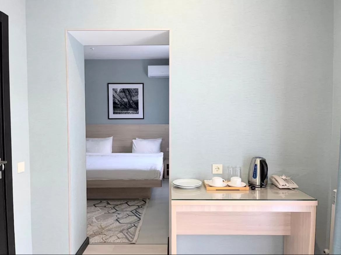 Coffee/tea facilities, Bed in Resident Hotel Gogol