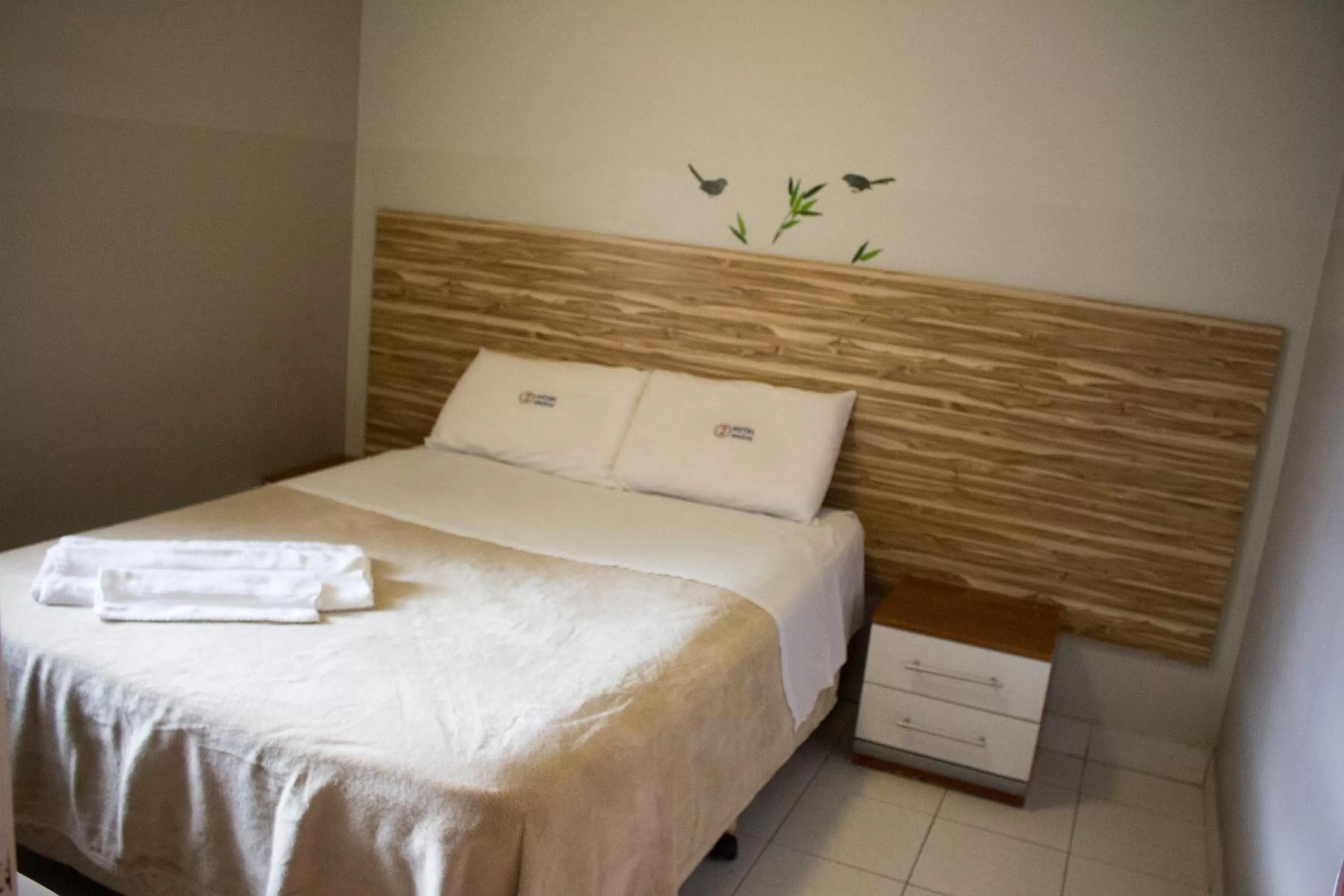 Bed in Hotel Dois Irmãos