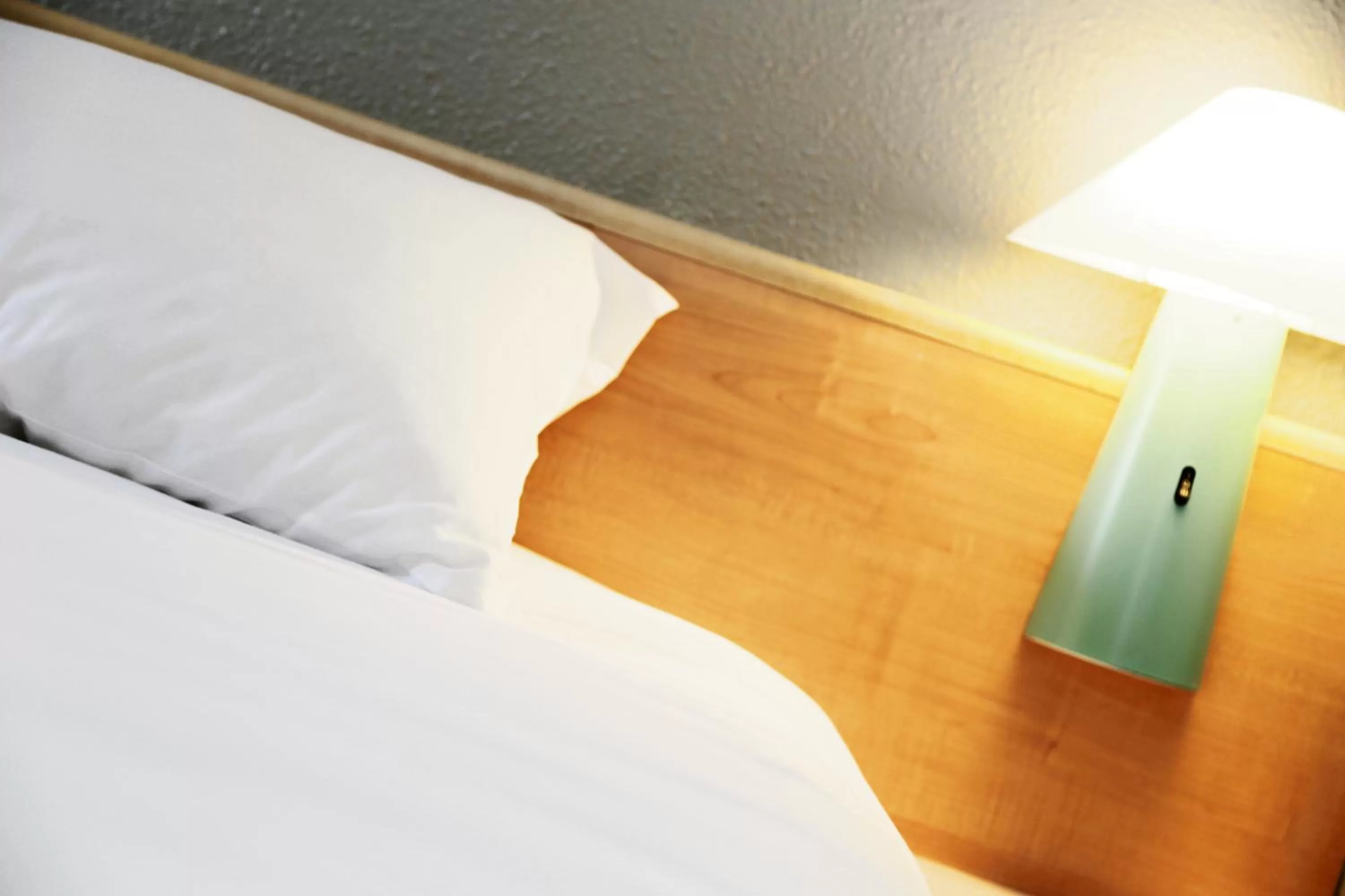 Decorative detail, Bed in ibis Orange Centre Echangeur A7 A9