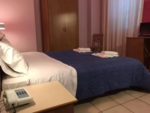 Bed in Hotel Pellegrino E Pace