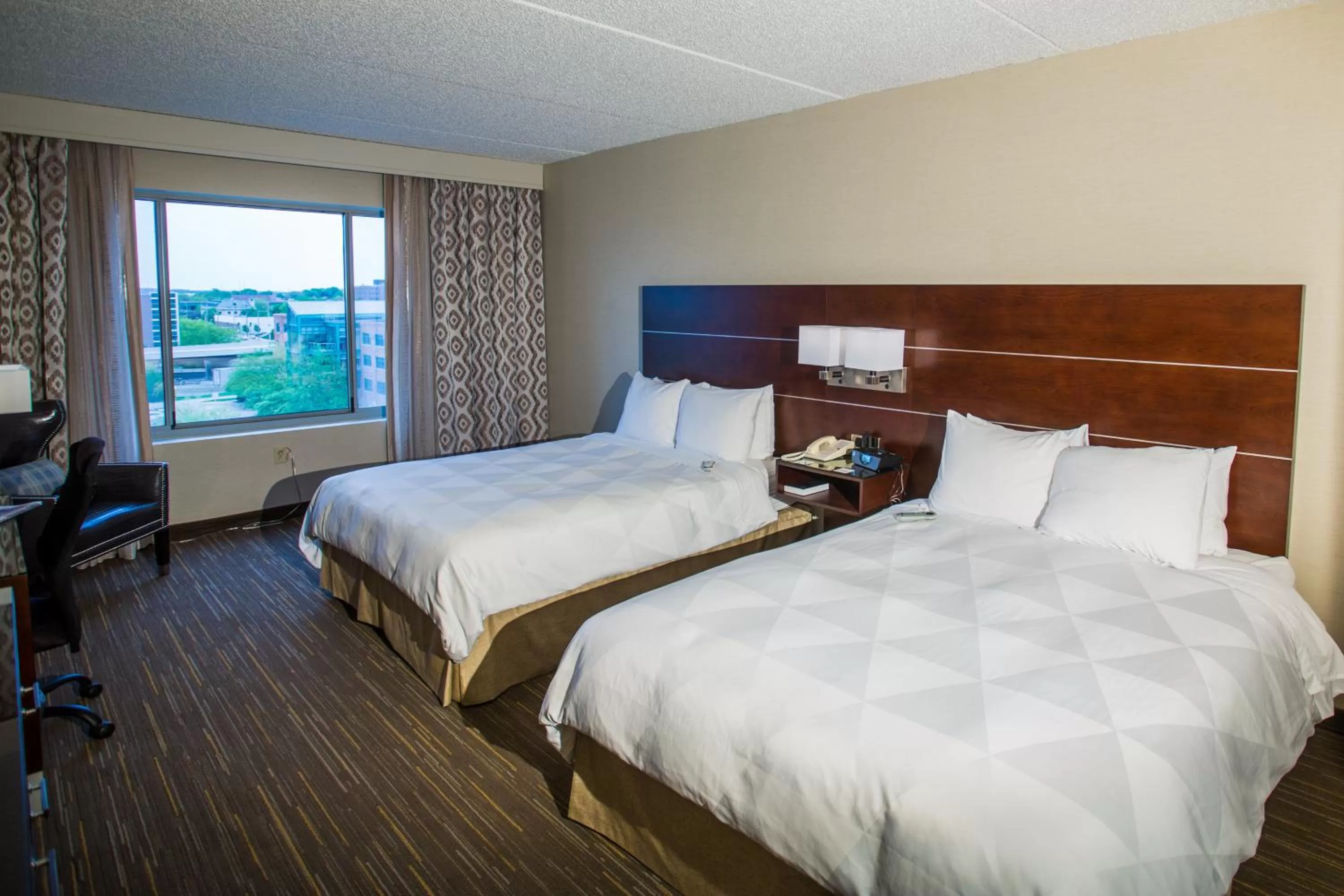 Photo of the whole room, Bed in Wyndham Moline on John Deere Commons