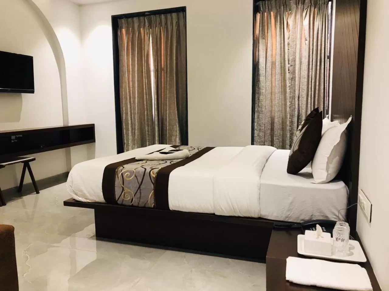 Bed in Hotel Flora Suites - Fort