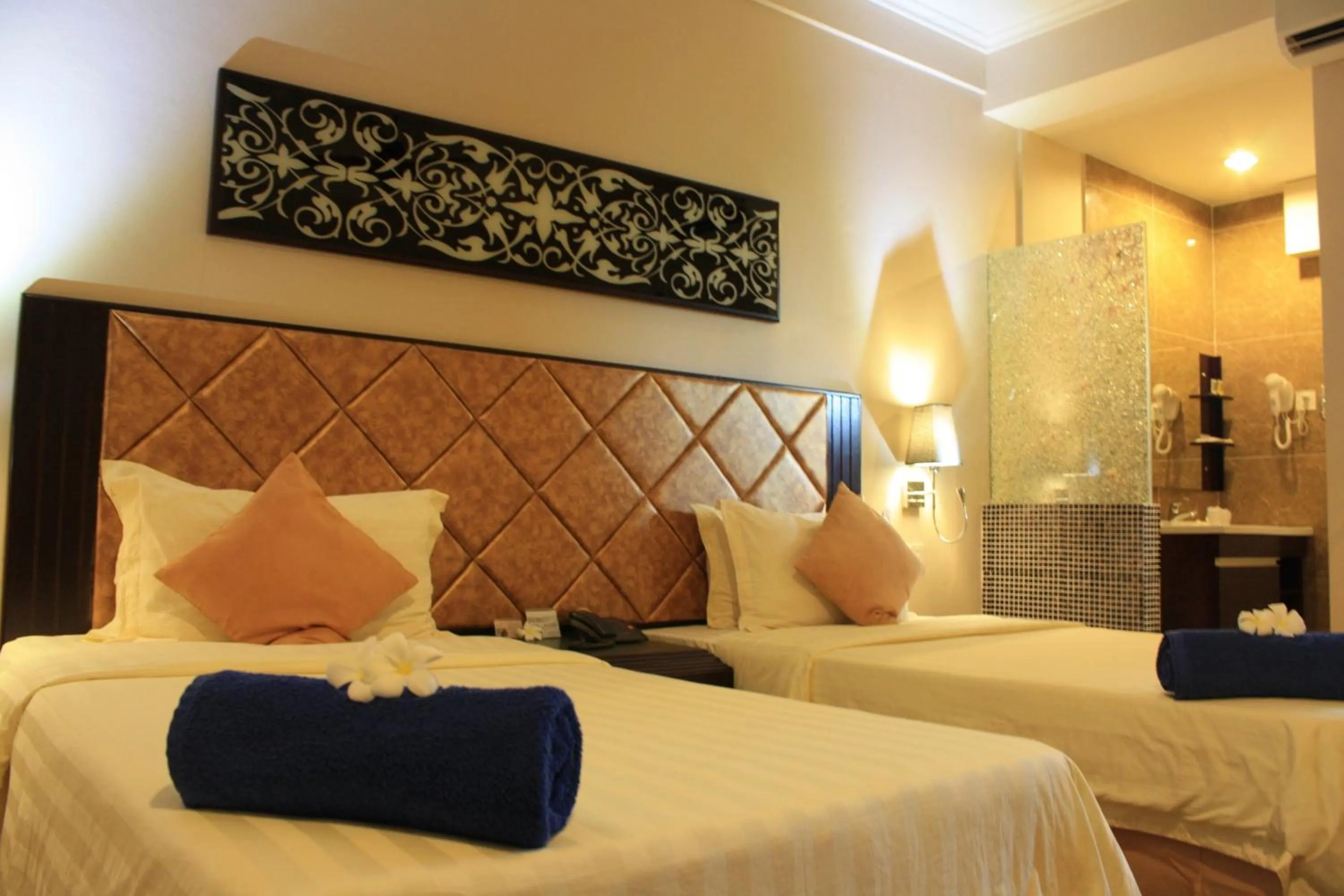 Bed in Beringgis Beach Resort & Spa