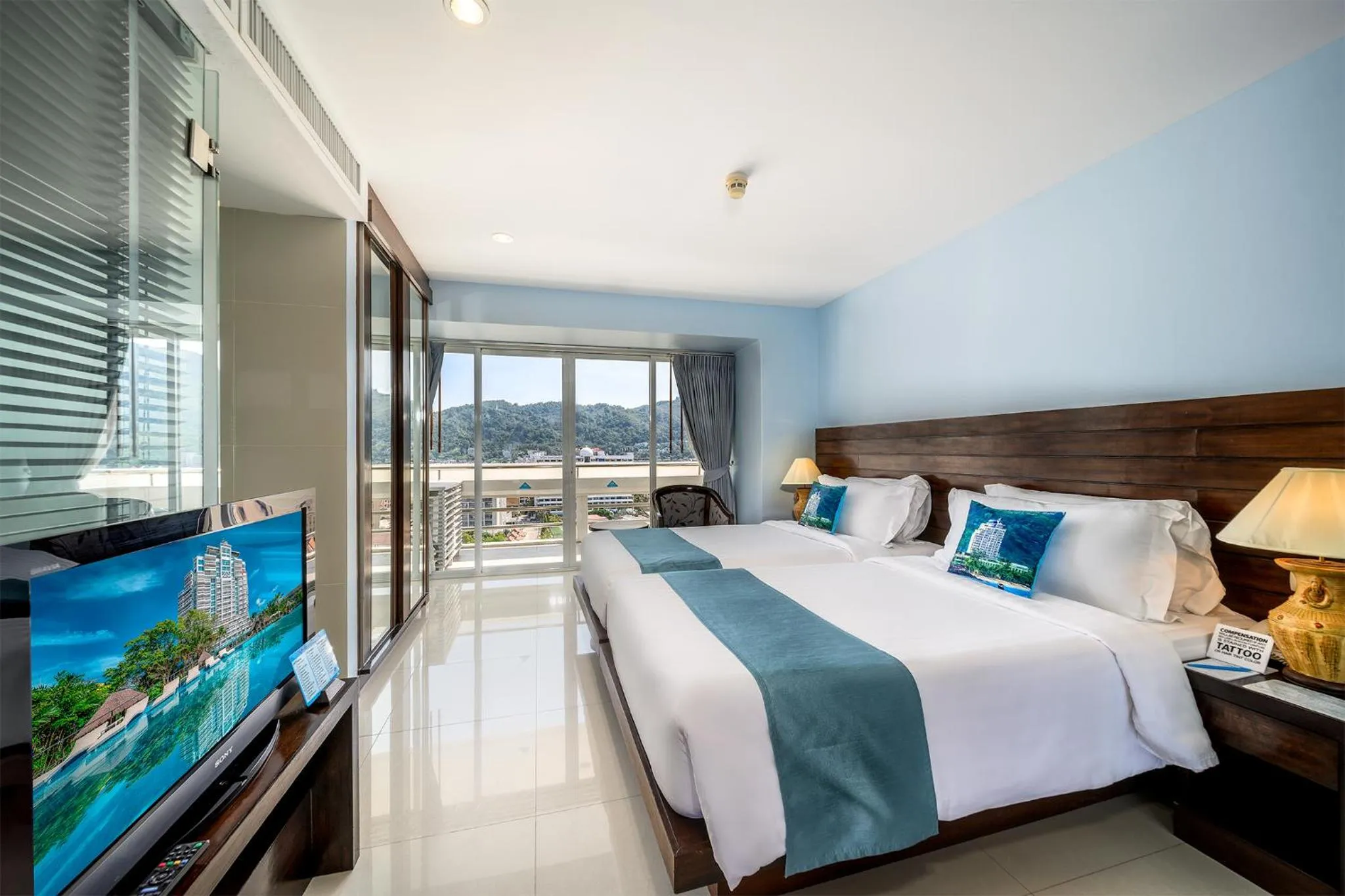 Bedroom, Bed in Andaman Beach Suites Hotel, Patong Phuket