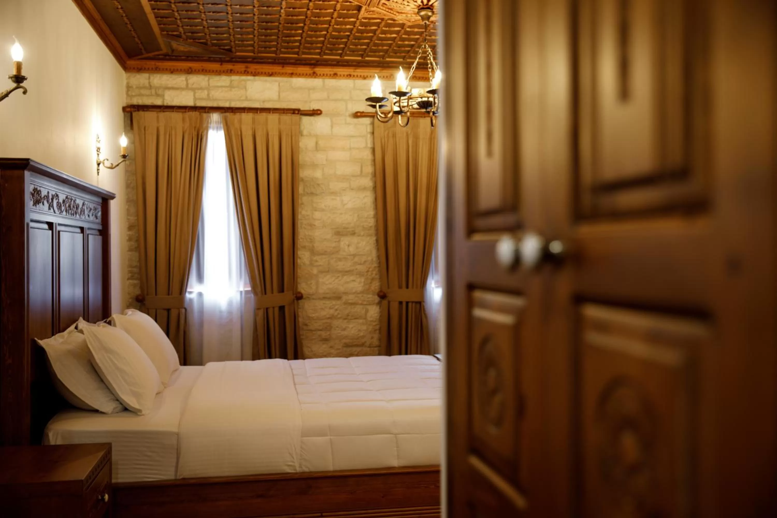 Bed in Rose Garden Hotel