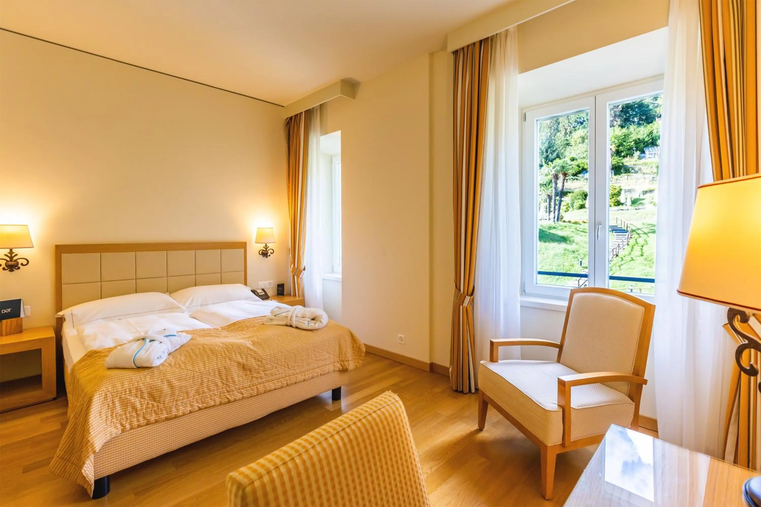 Bedroom, Bed in Kurhaus Cademario Hotel & SPA - Adults Only