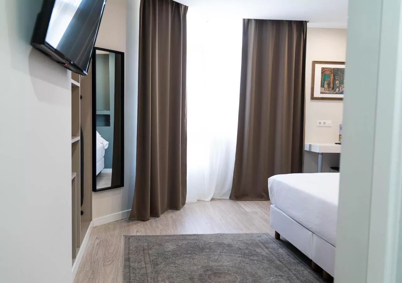 TV and multimedia, Bed in Hotel Pasarela