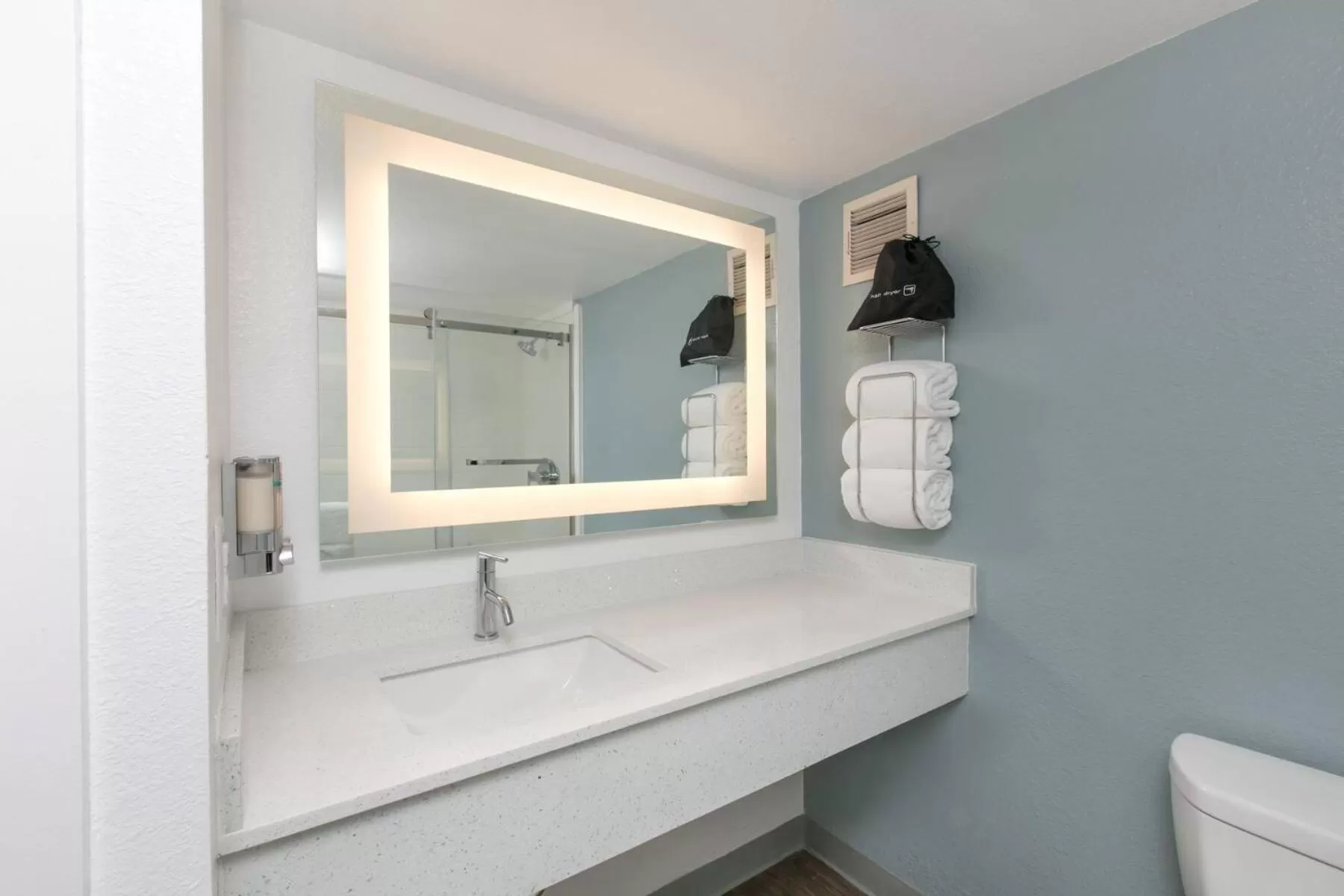 Bathroom in voco College Station Aggieland by IHG