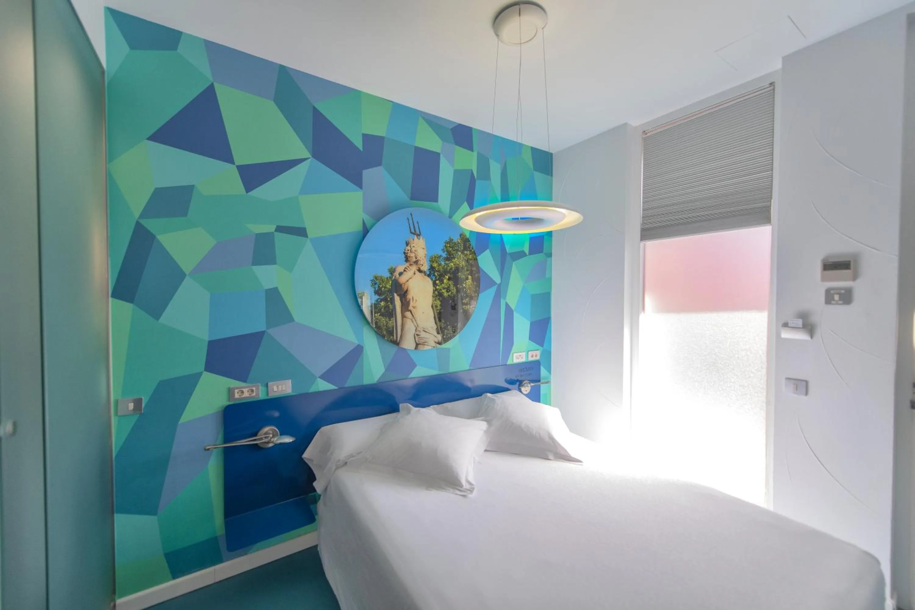 Bed in Posada del Dragón Boutique Hotel