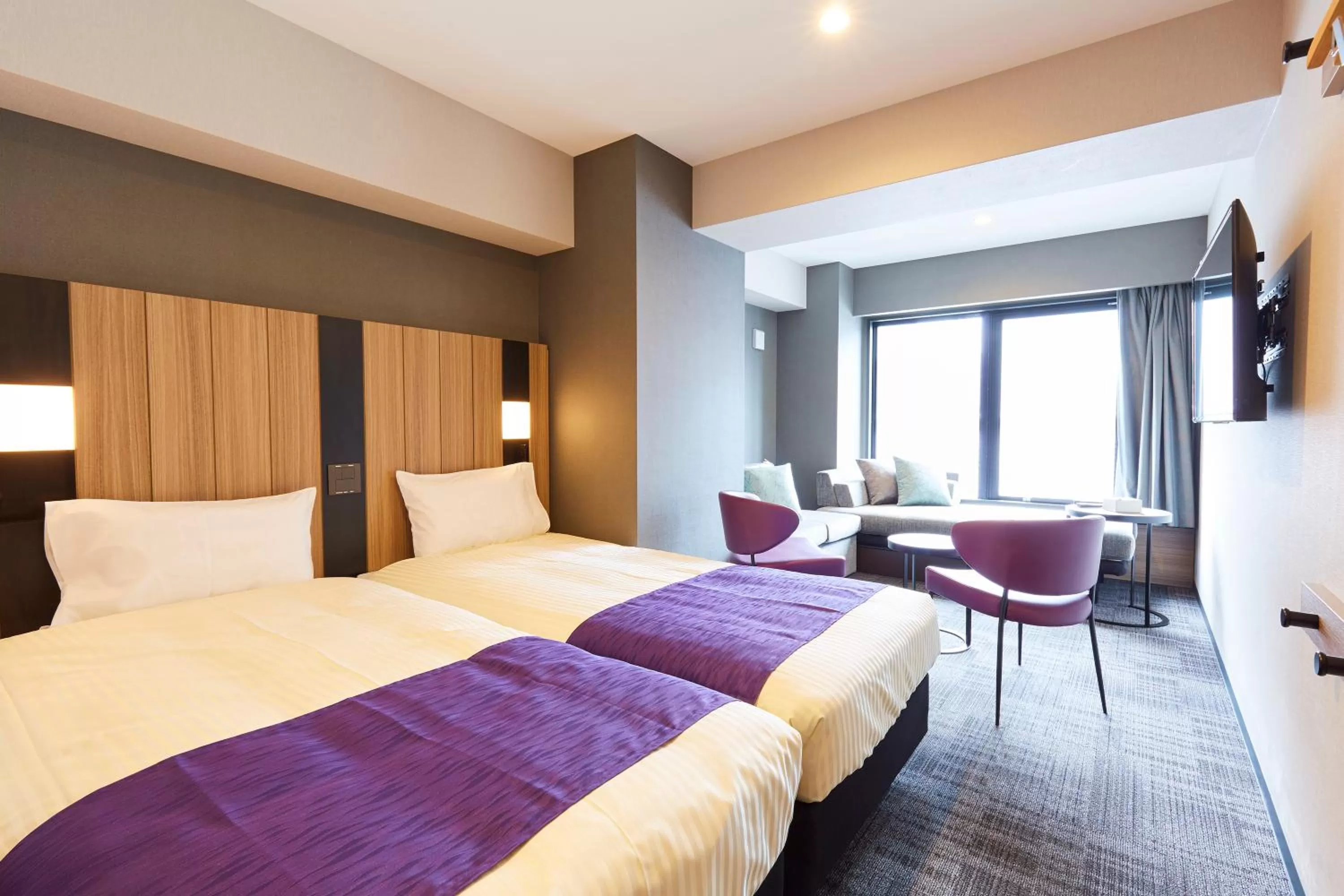 Bed in hotel MONday Kyoto Karasuma Nijo