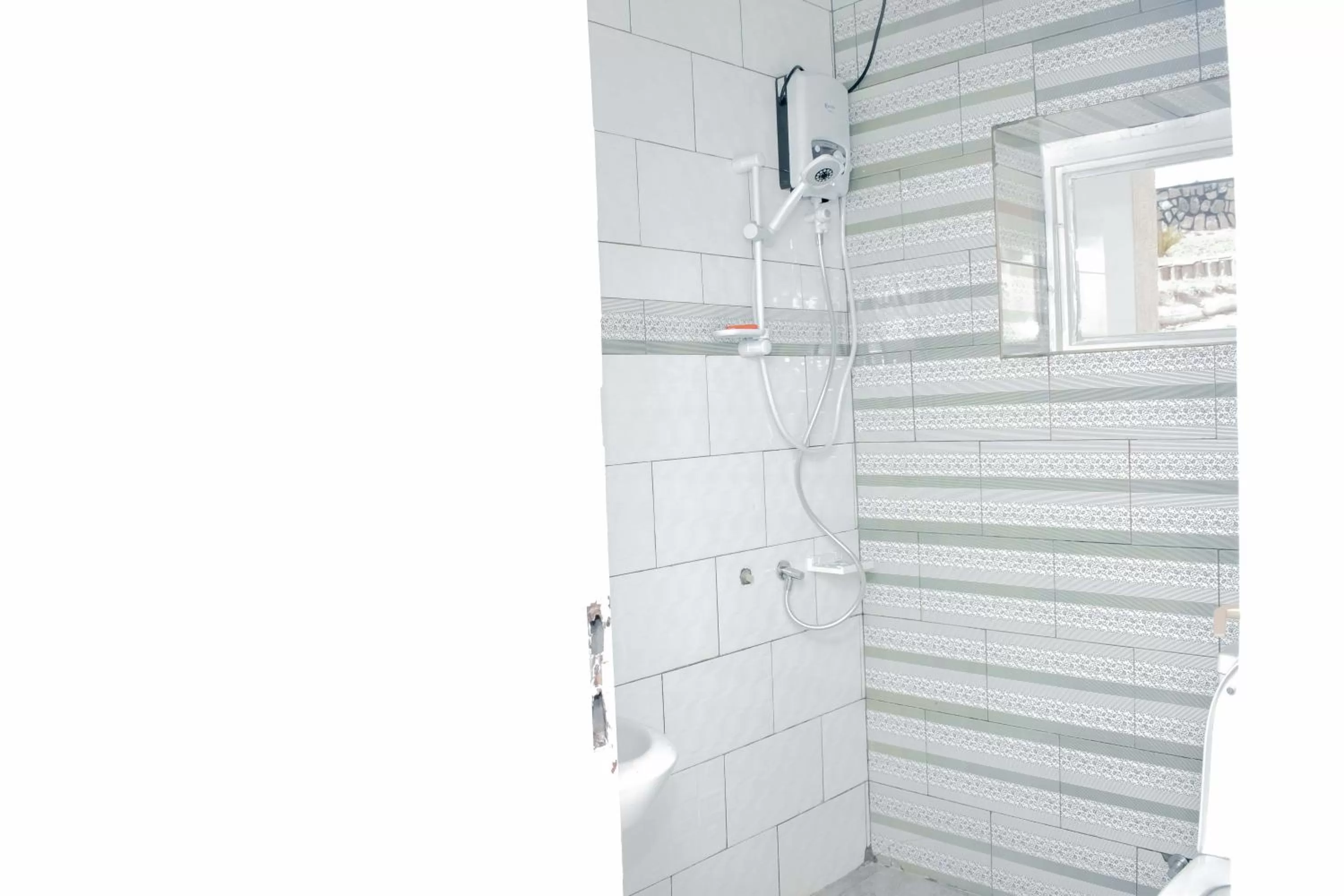 Shower in INZOZI AFRICA HOUSE B&B-Gishushu