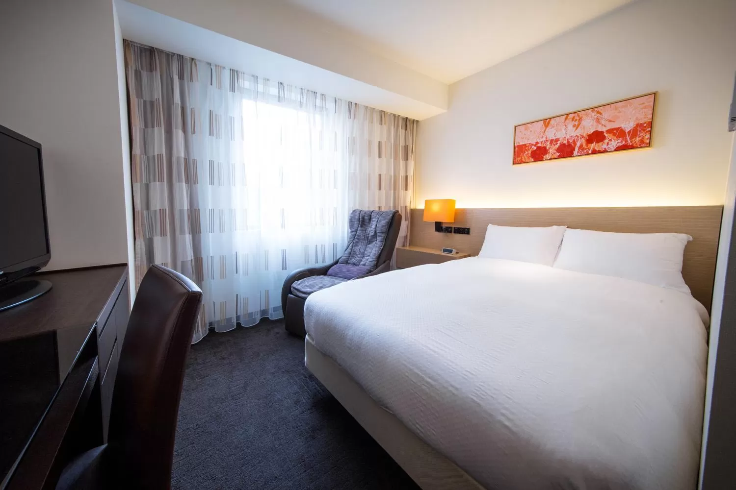 Bed in HOTEL FORZA HAKATAEKI CHIKUSHI-GUCHI Ⅰ