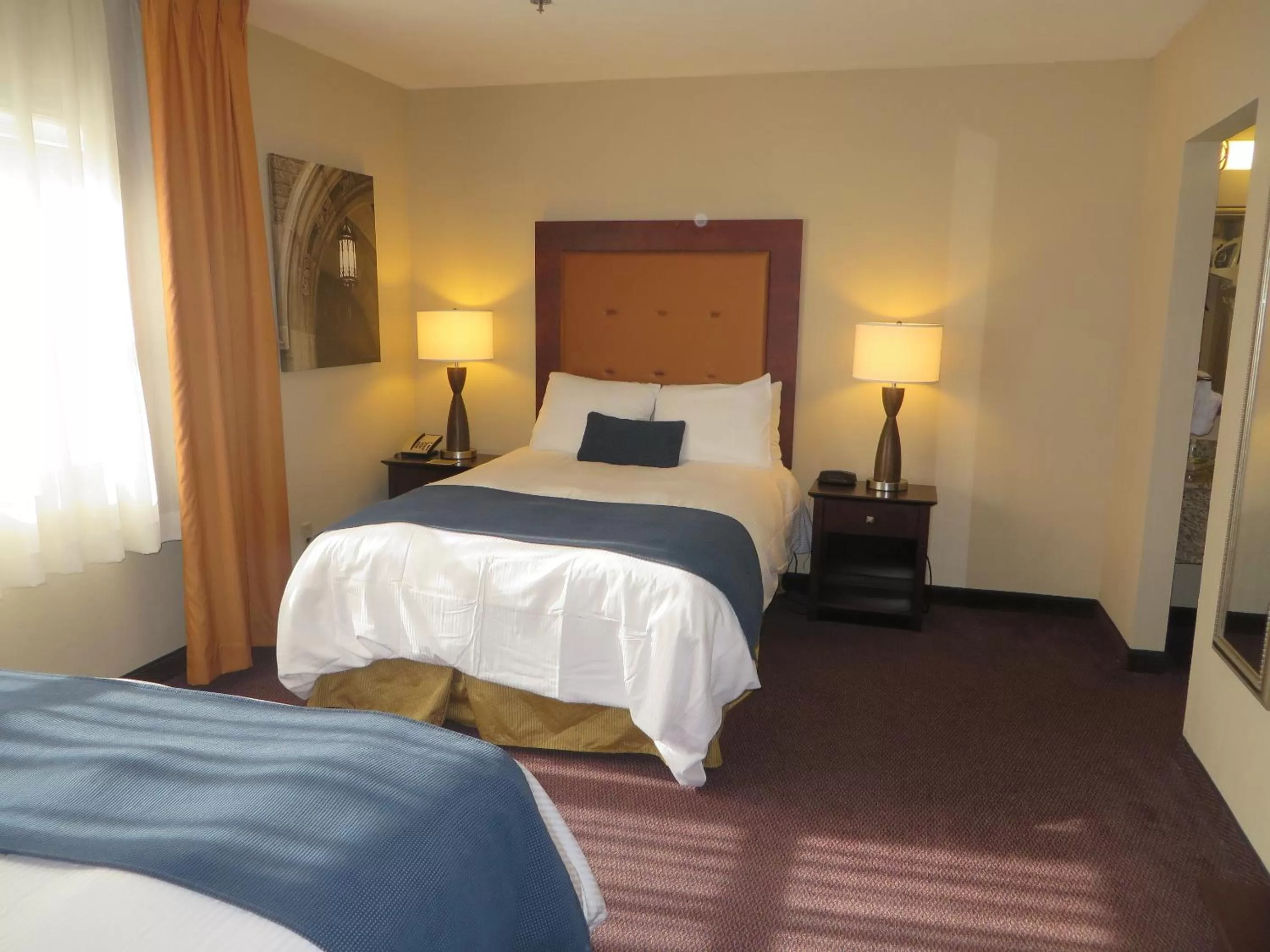 Bedroom, Bed in Ivy Court Inn and Suites