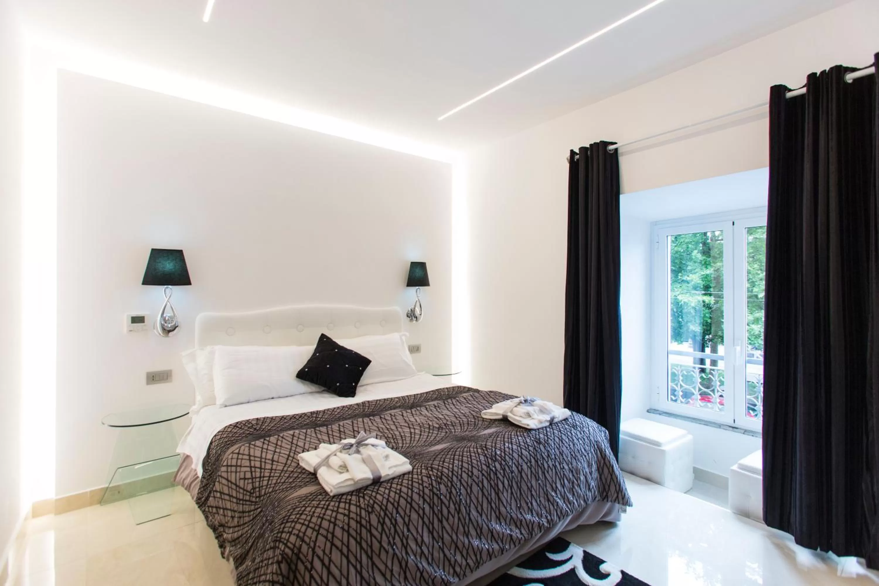 Bed in San Pietro Grand Suite