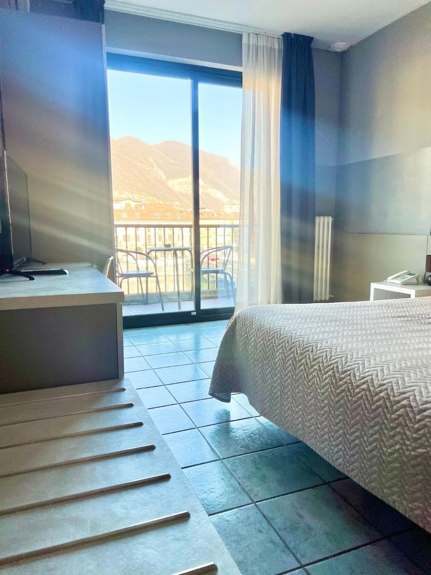 Bed in Hotel Stazione sul lago di Iseo