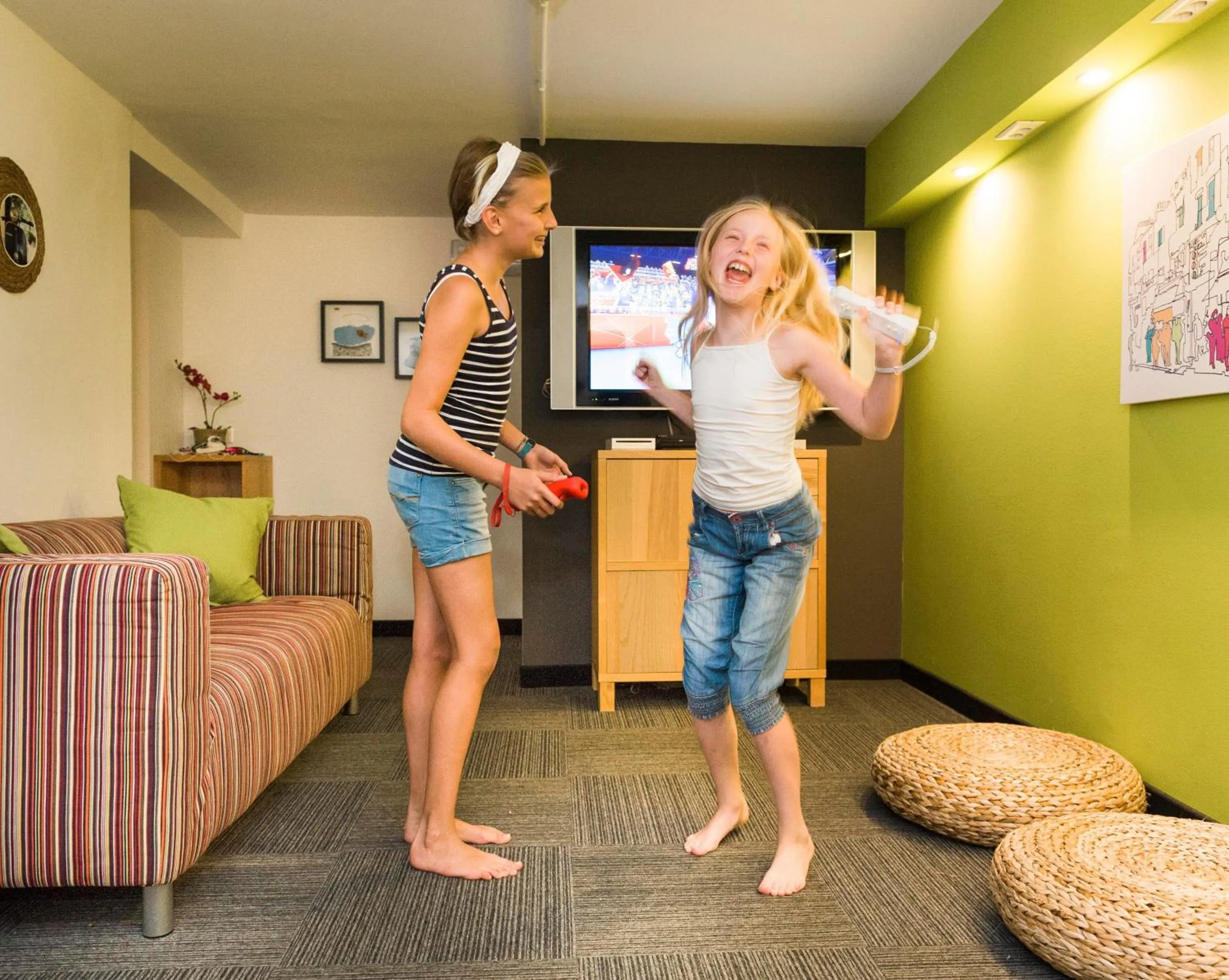 Communal lounge/ TV room in Active & Family Hotel Gioiosa