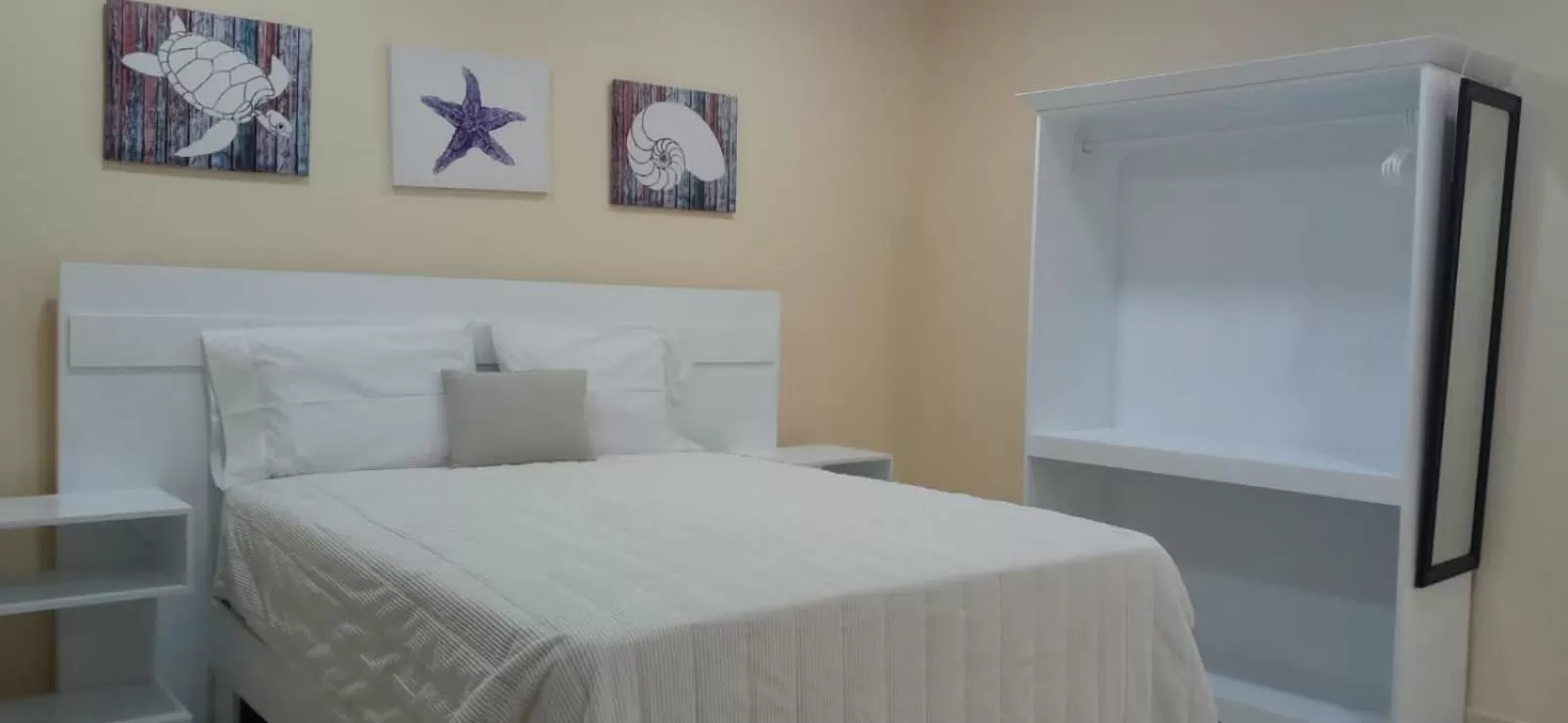 Bed in Apartahotel MACADANA