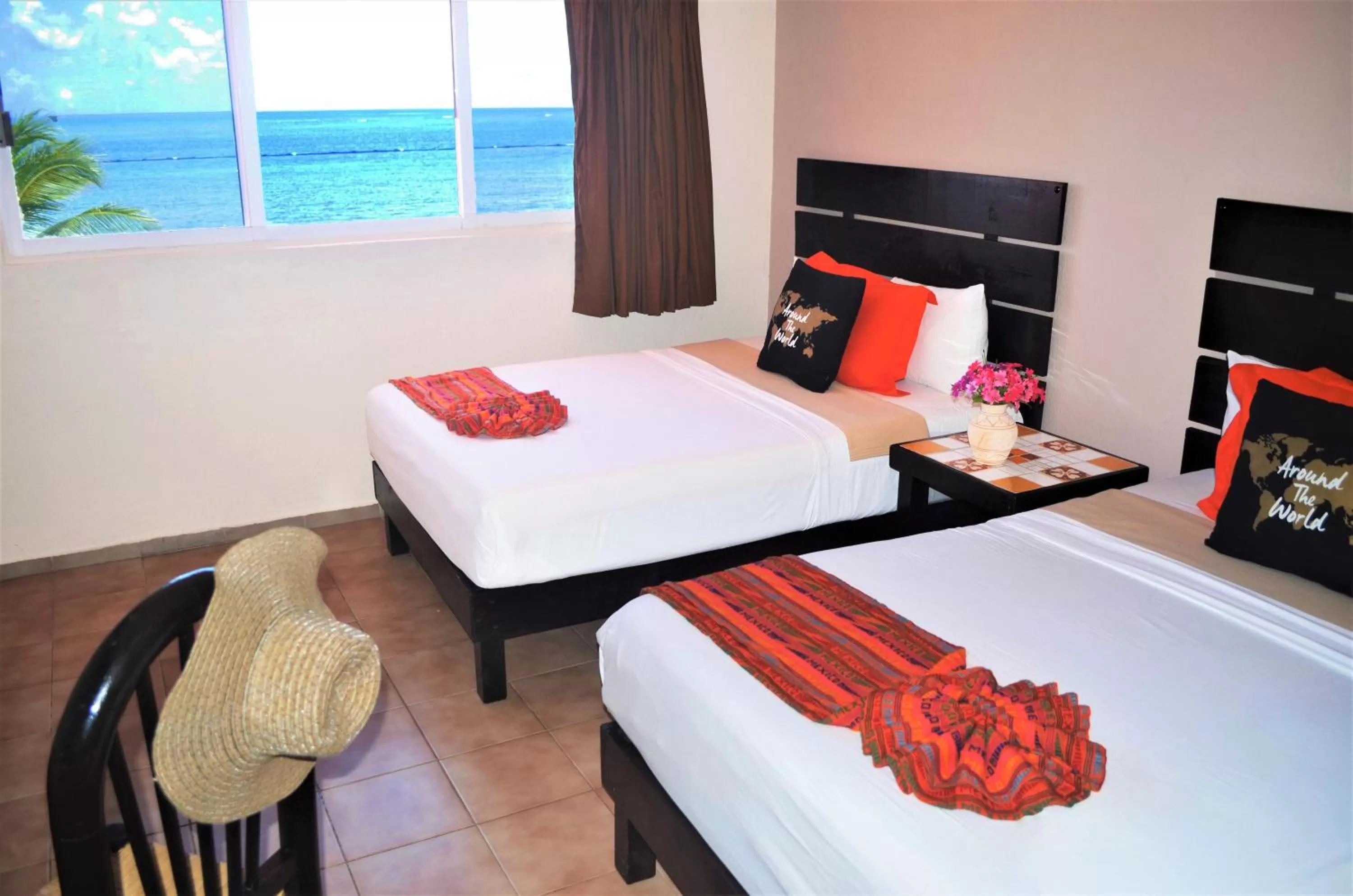 Photo of the whole room, Bed in Hacienda Morelos Beachfront Hotel