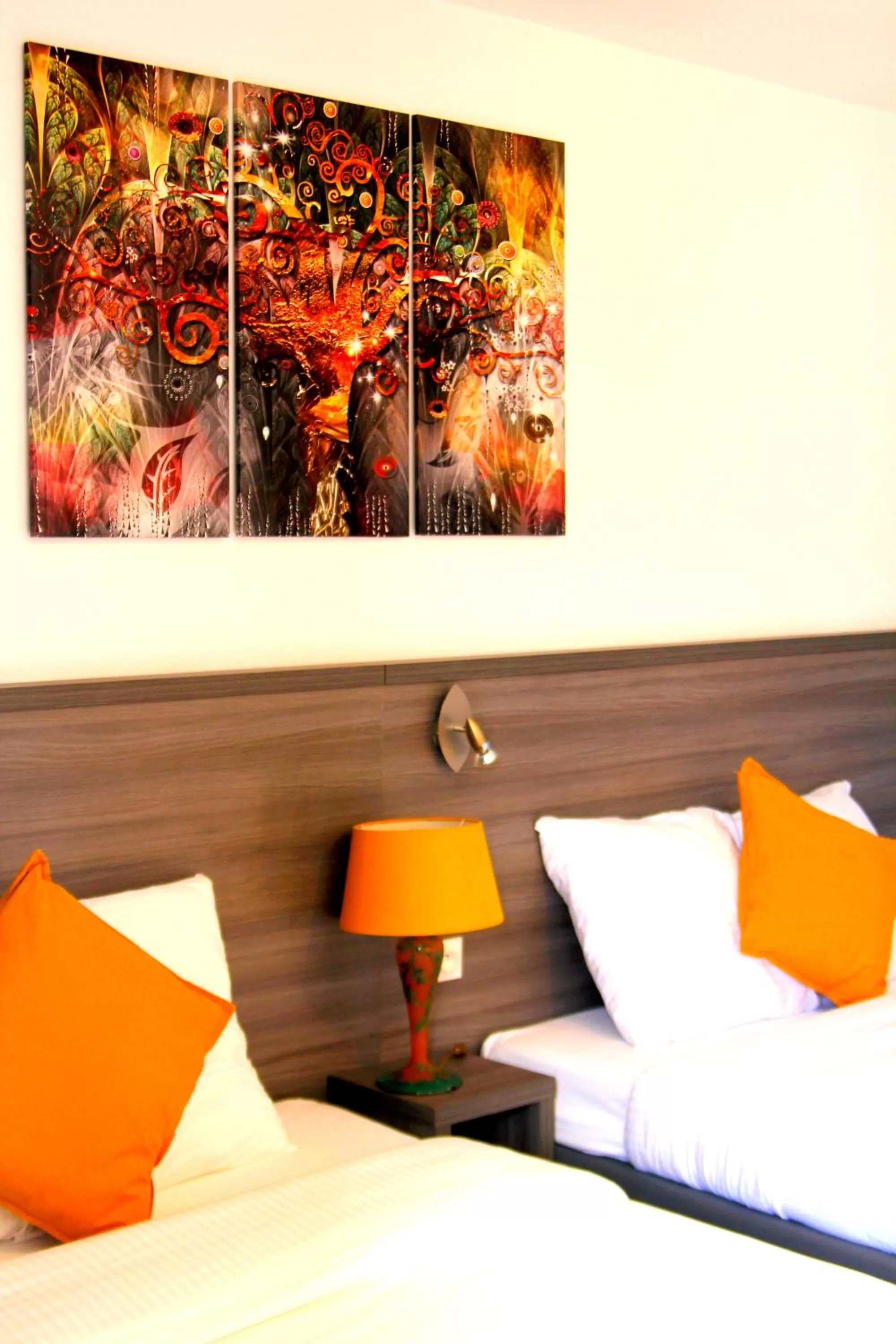 Bed in Logis Hôtel Vuillot