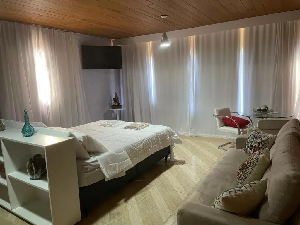 Bed in Pousada R.N.C. Nosso Paraíso