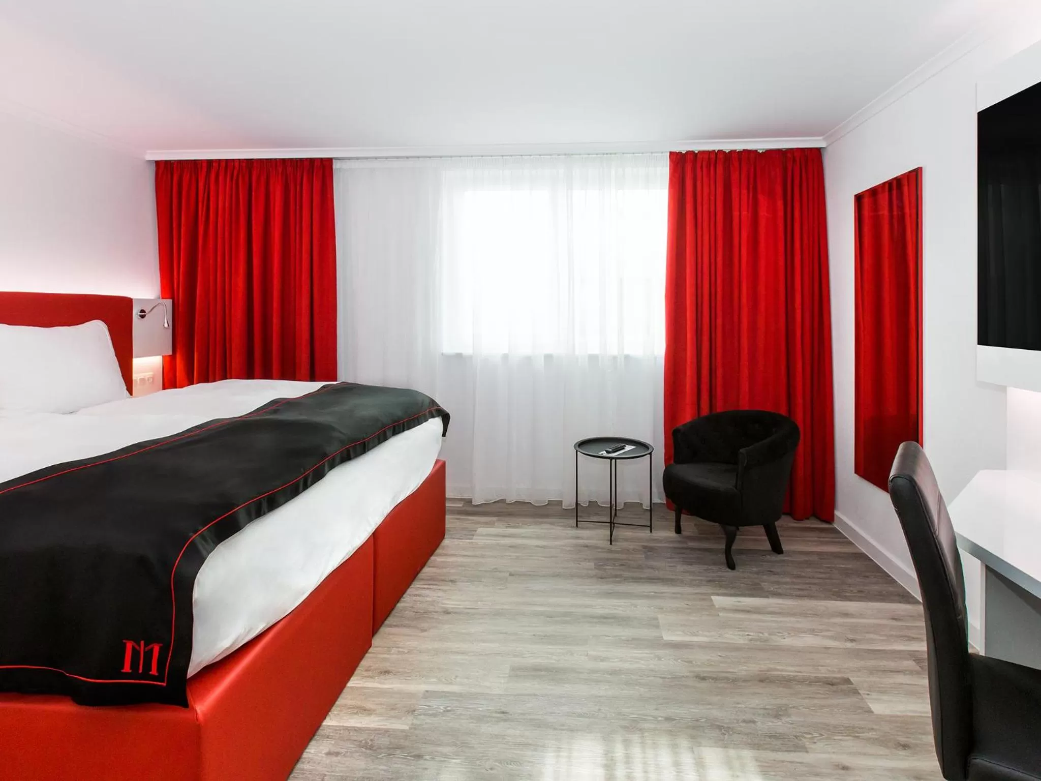 Photo of the whole room, Bed in DORMERO Hotel Zürich Airport
