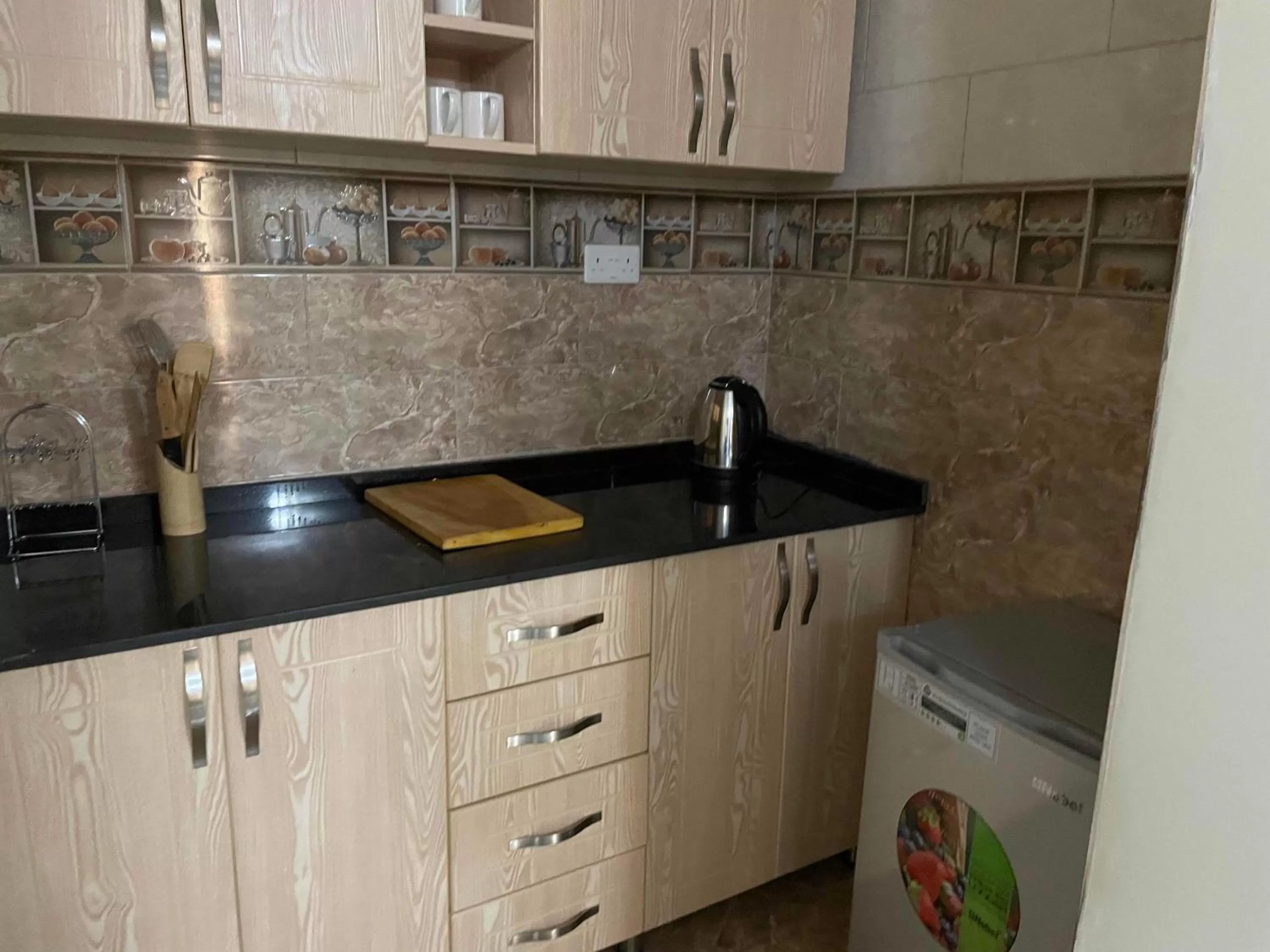 Kitchen or kitchenette in Jaffa Suites