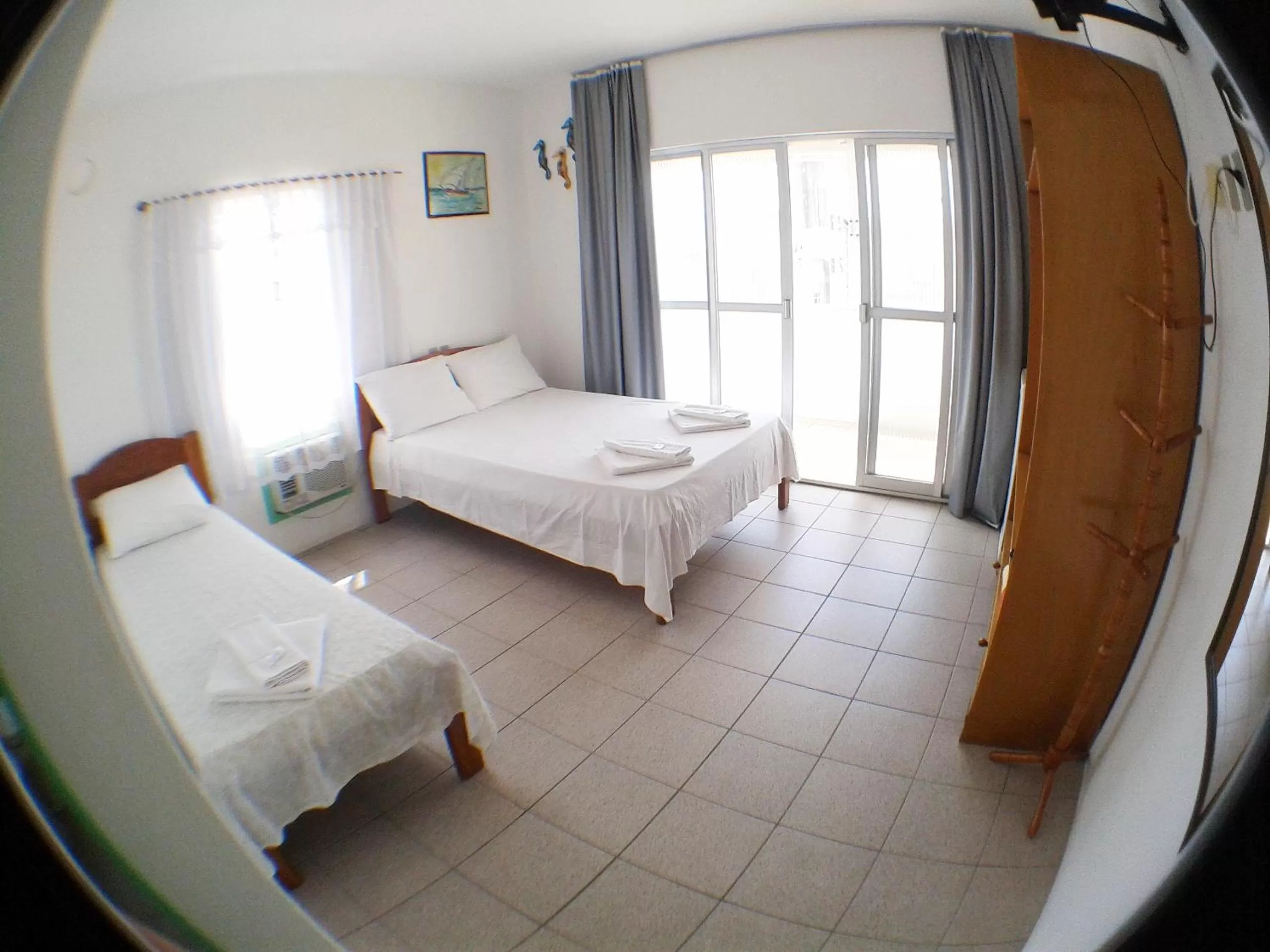 Bed in Pousada Milani