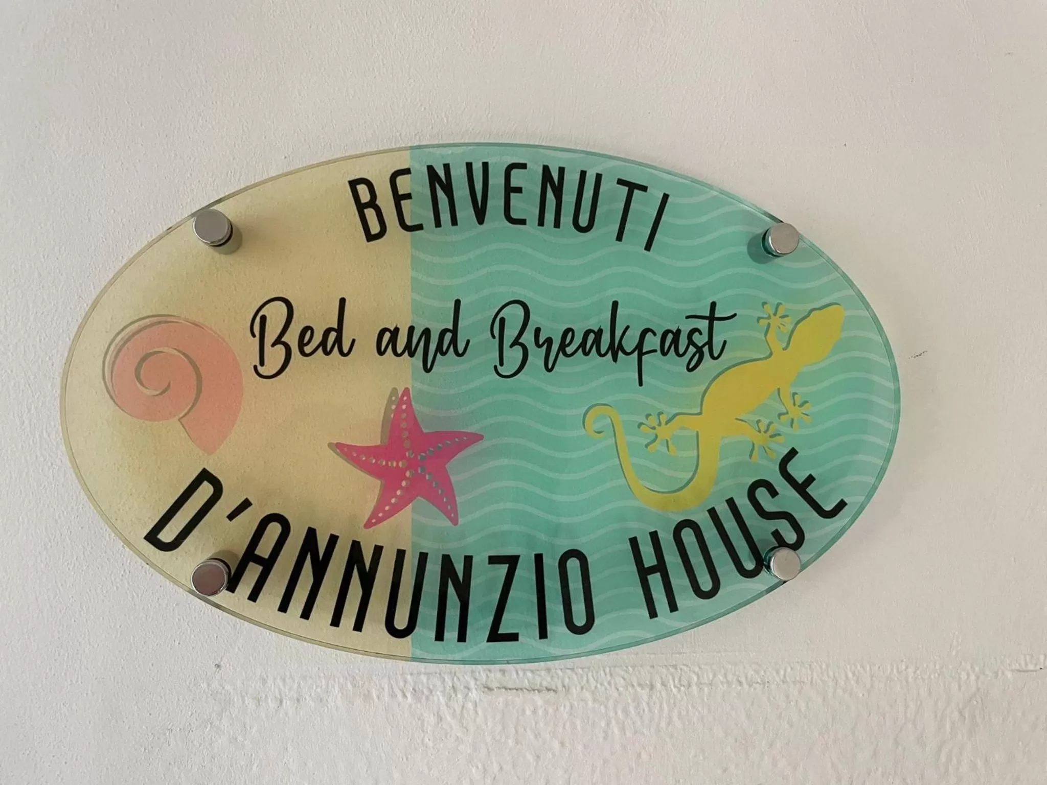 Property logo or sign in D ANNUNZIO house