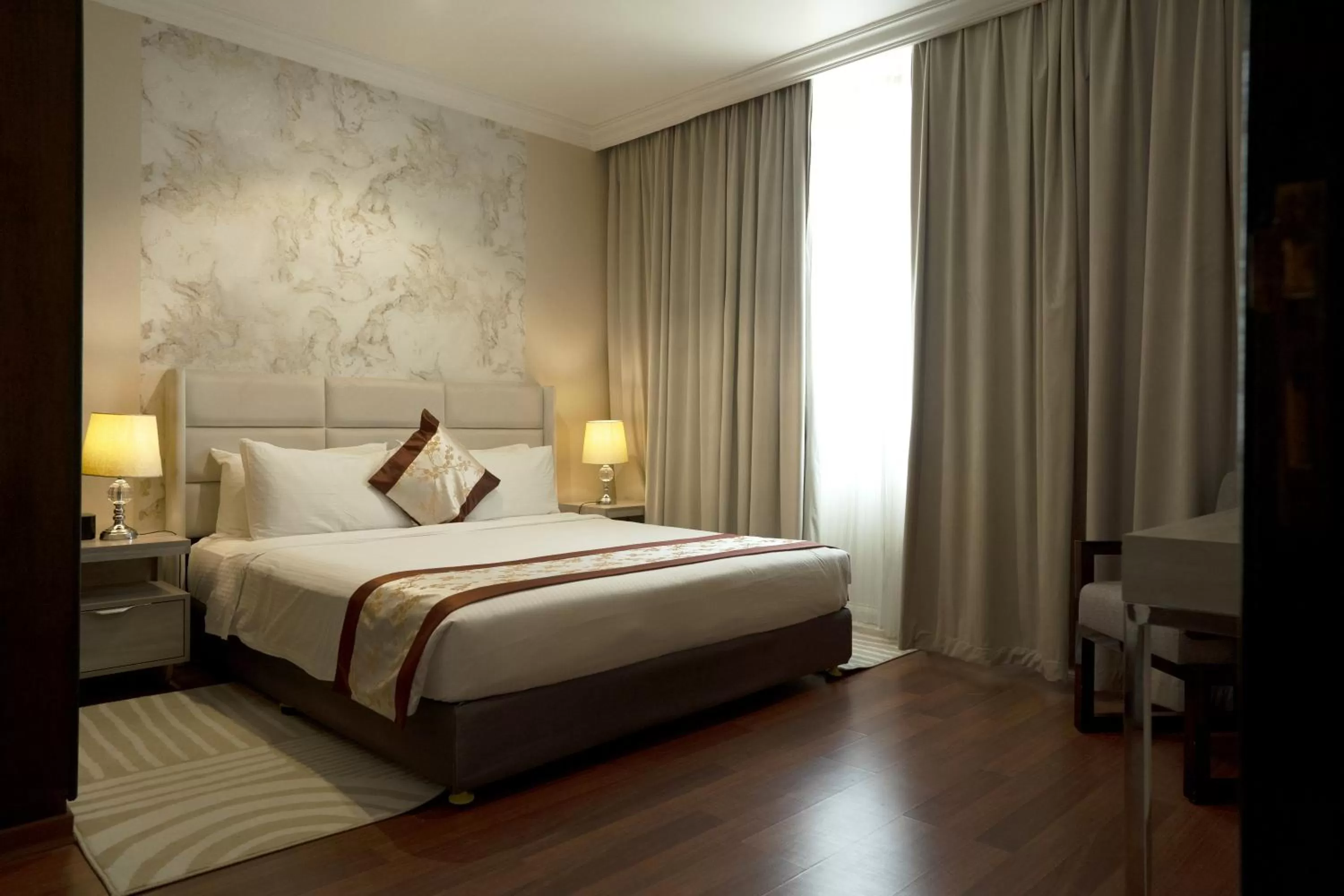 Bed in City Tower Hotel