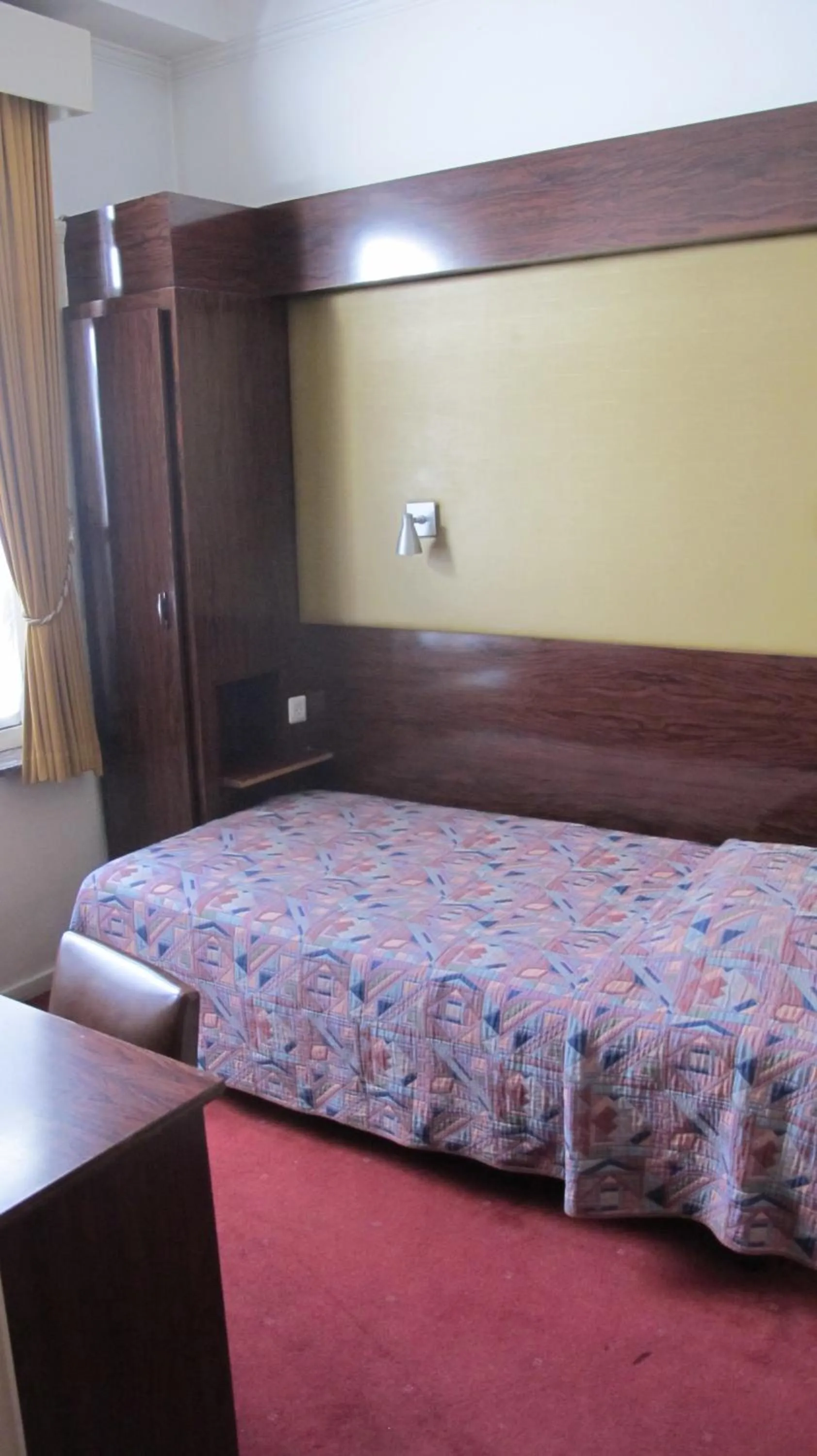 Bed in Hotel Manhattan