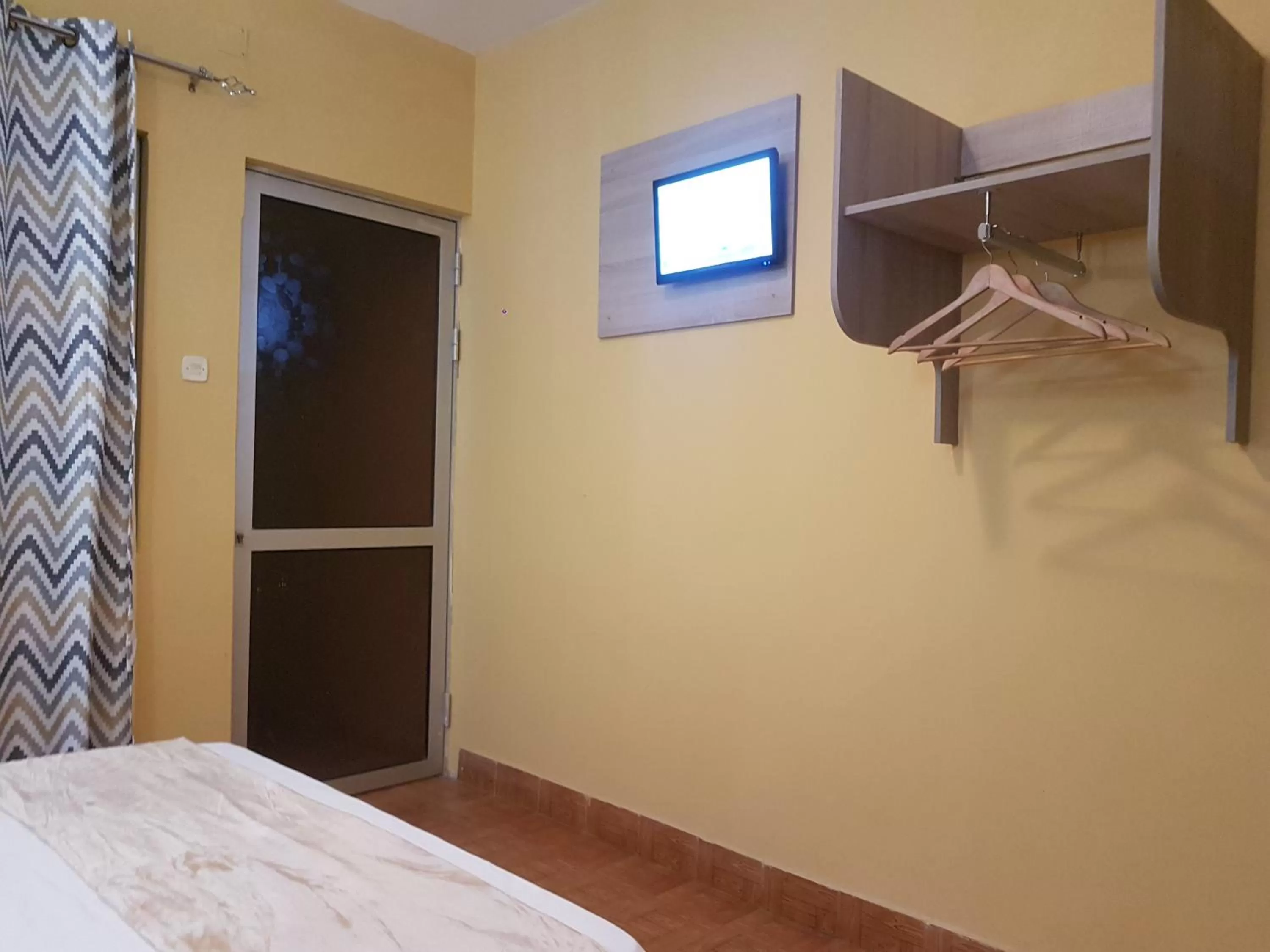 TV and multimedia, Bed in Pensão Asa Branca