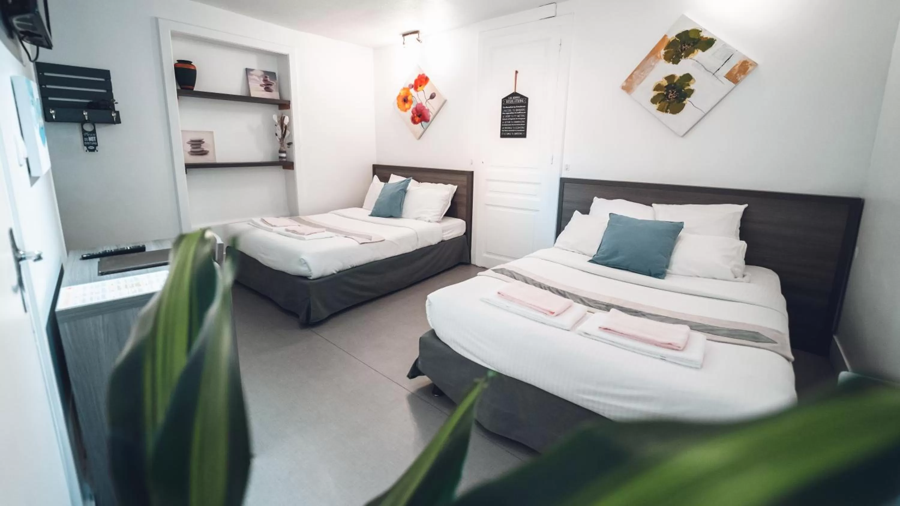 Bed in Logis Hôtel Vuillot