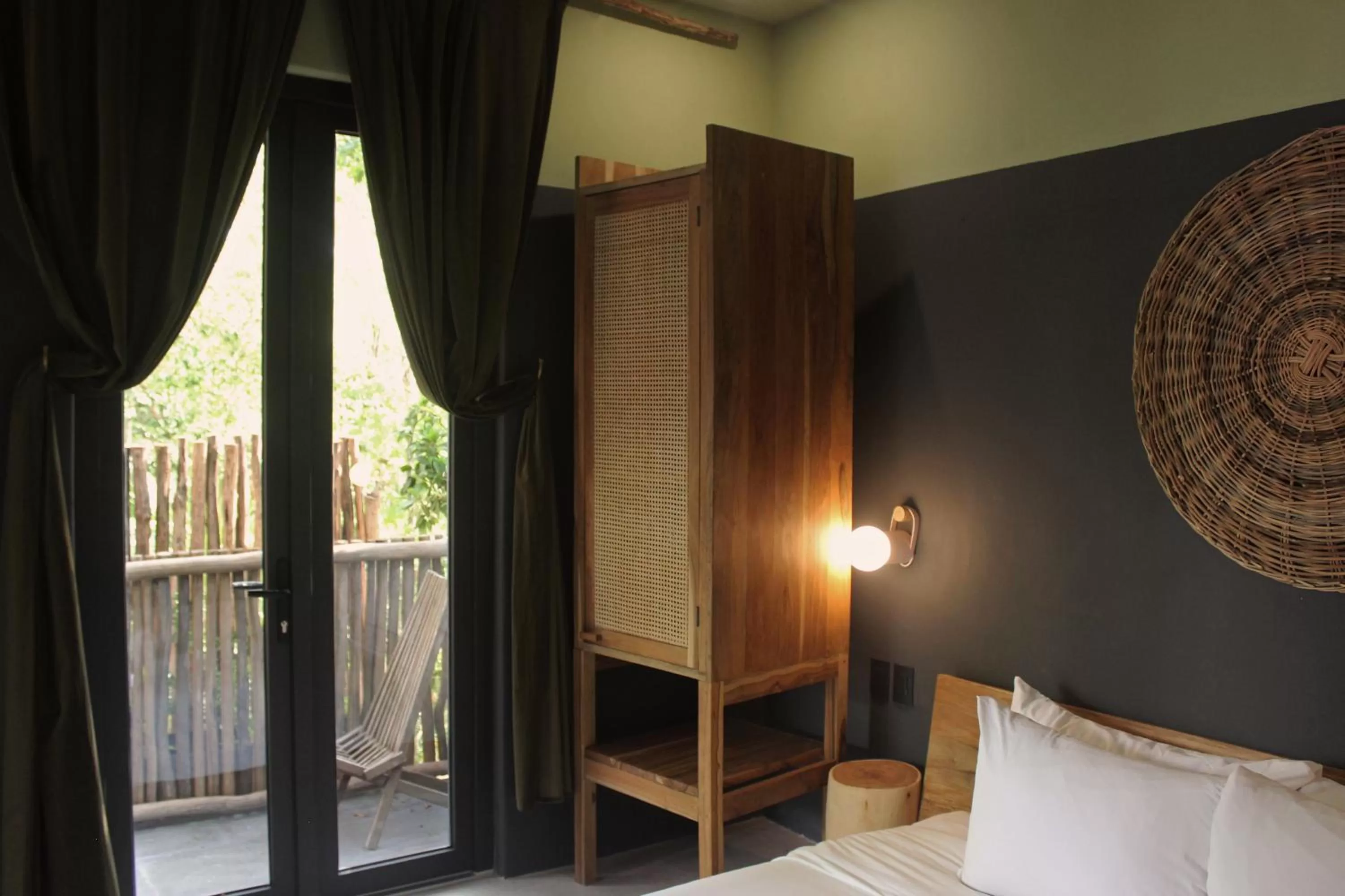 Photo of the whole room, Bed in Loba Tulum Male Only