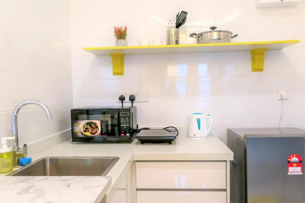 Kitchen or kitchenette in Arte Mont Kiara Hotel Suite