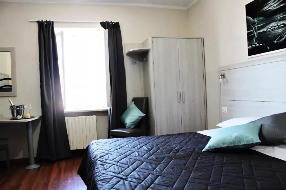 Photo of the whole room, Bed in Nuovo Hotel Giardini