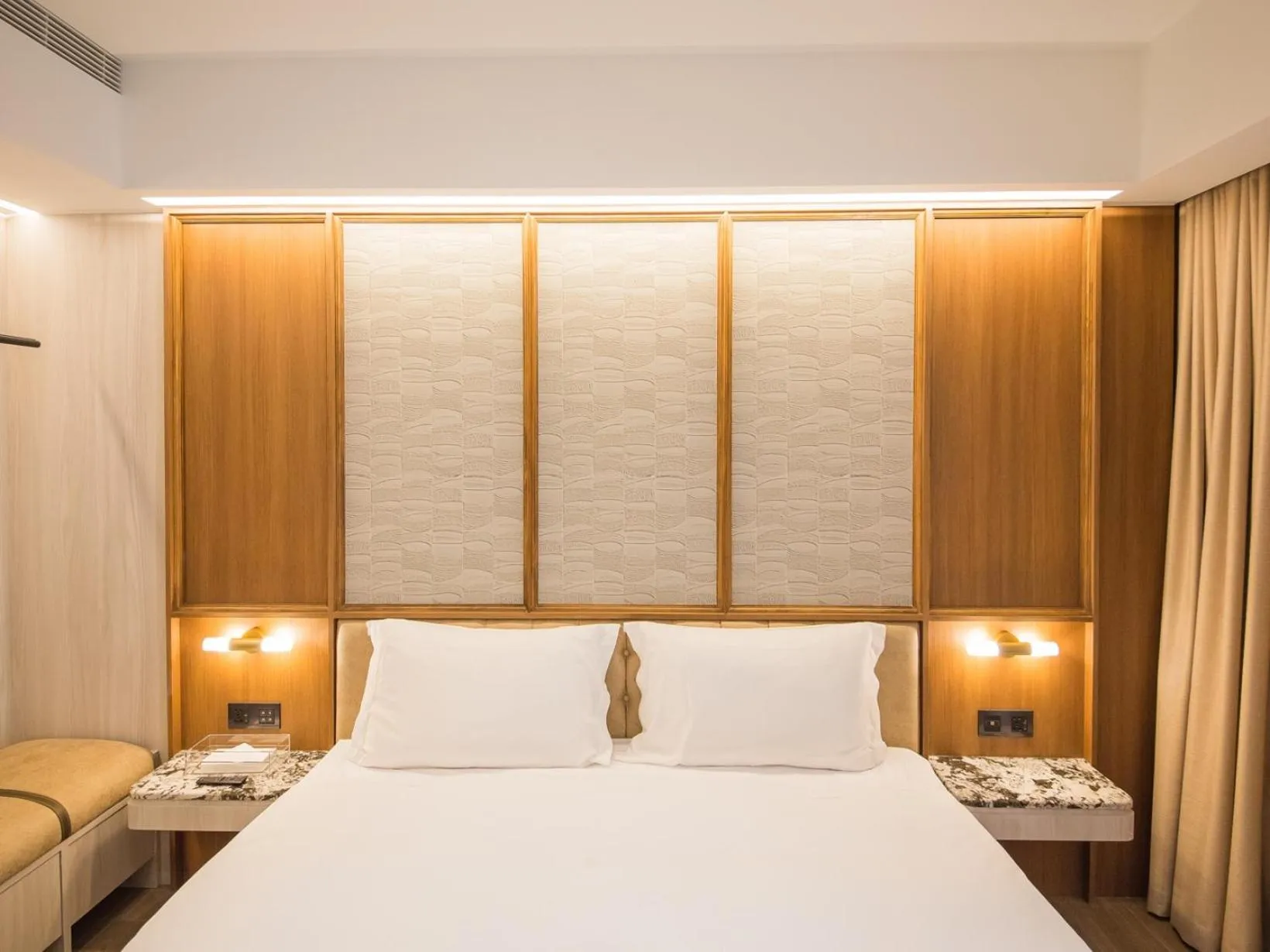 Bed in Hôtel de Ľeau