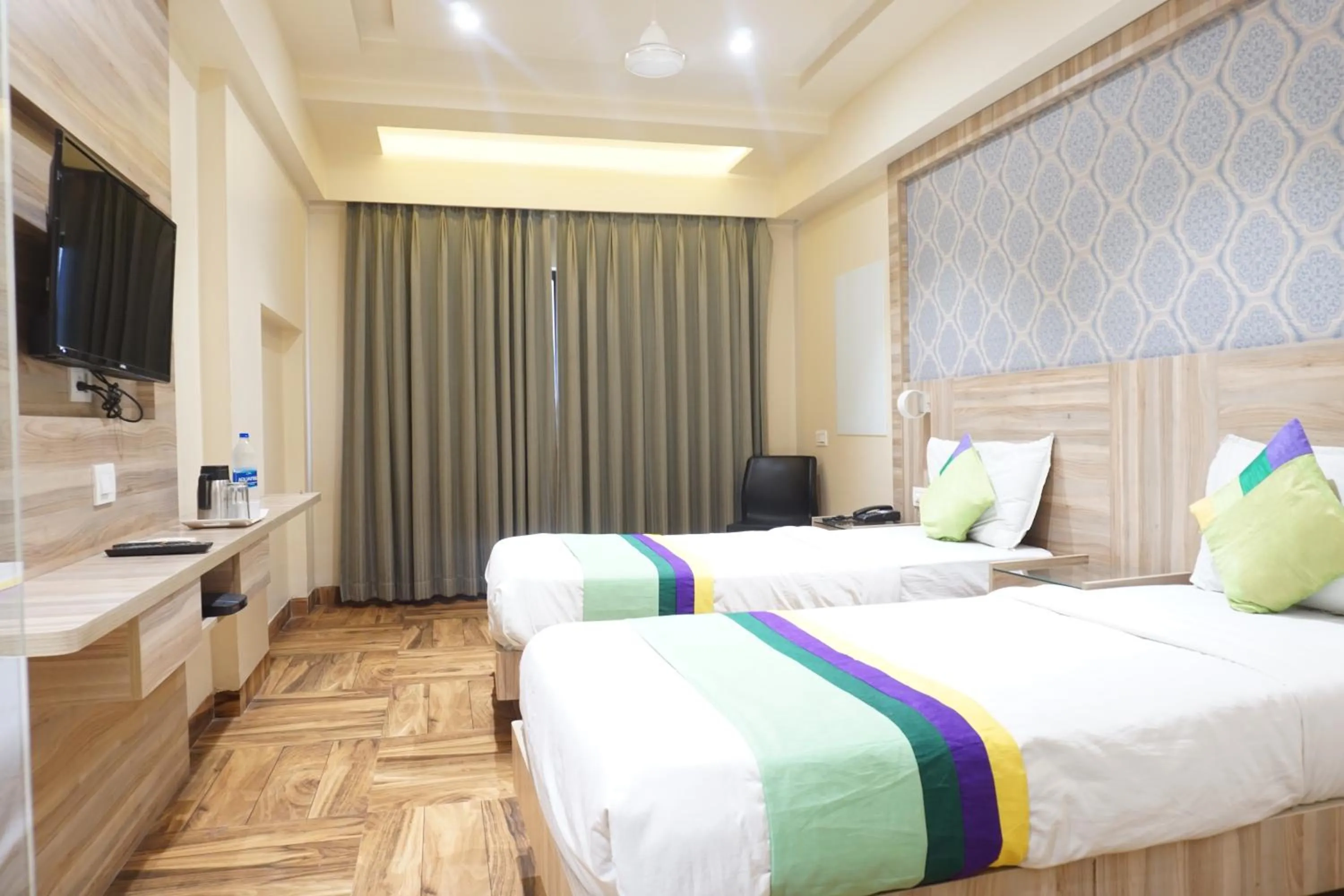 Bedroom, Bed in Treebo Classic Grande, Camp