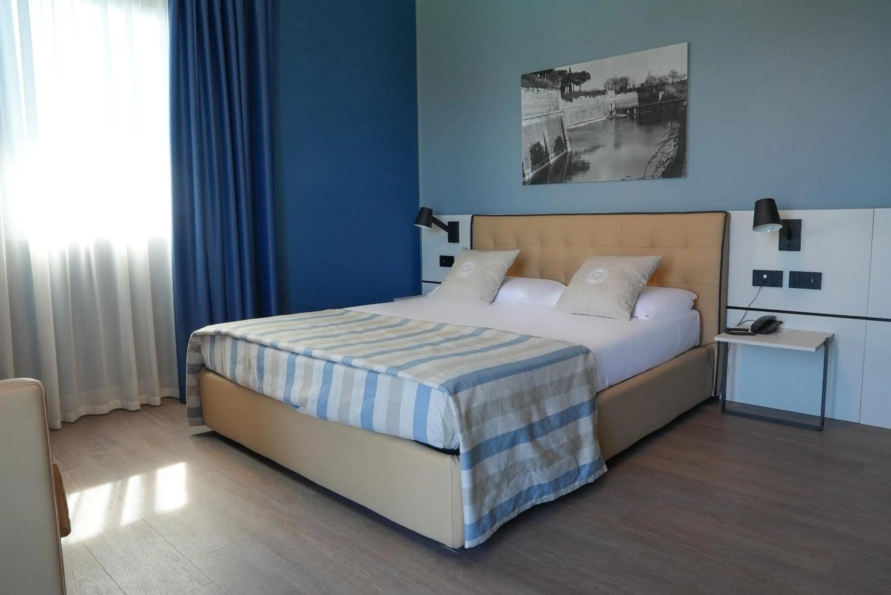 Bed in Hotel Puccini