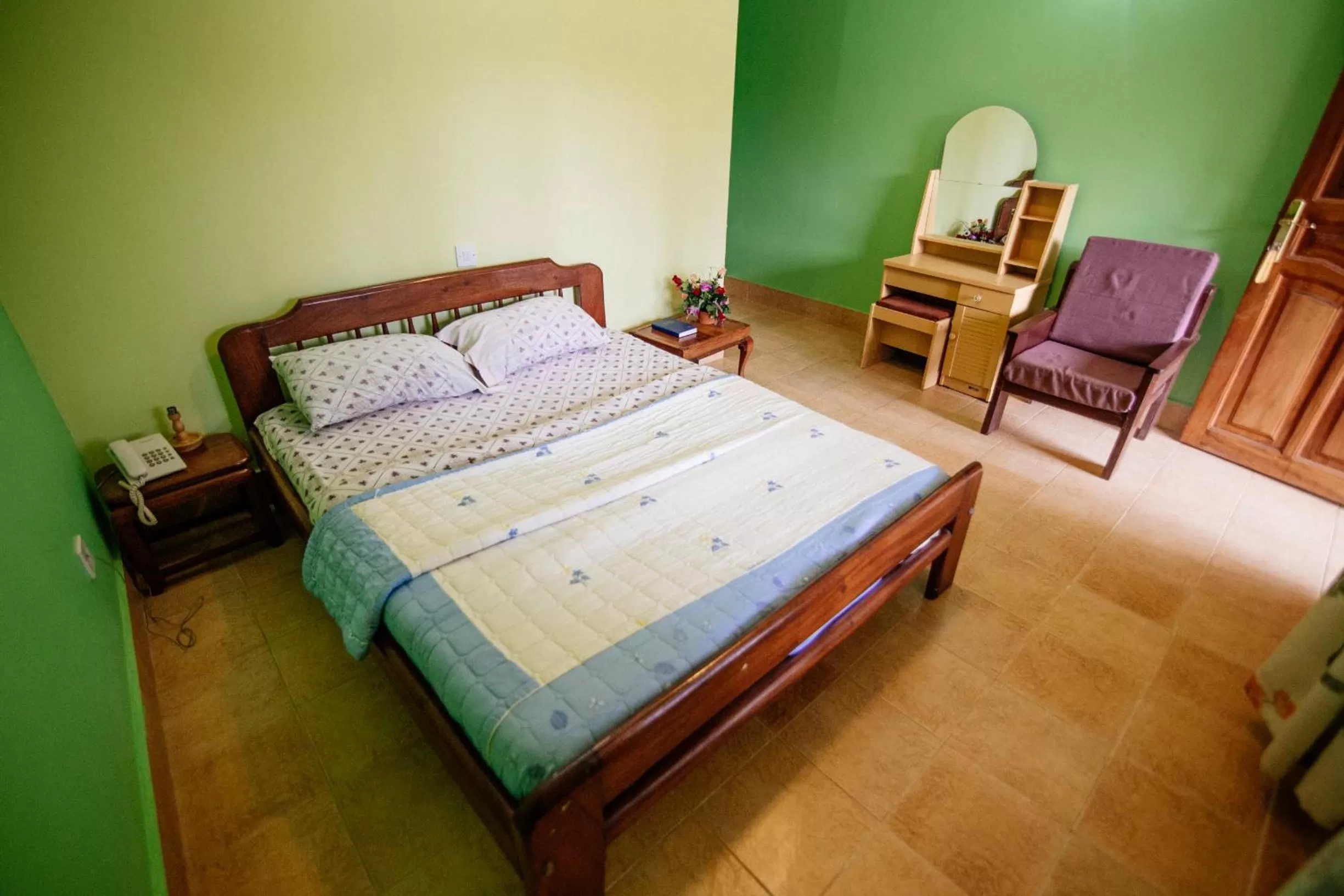 Bed in Bunyonyi Overland Resort