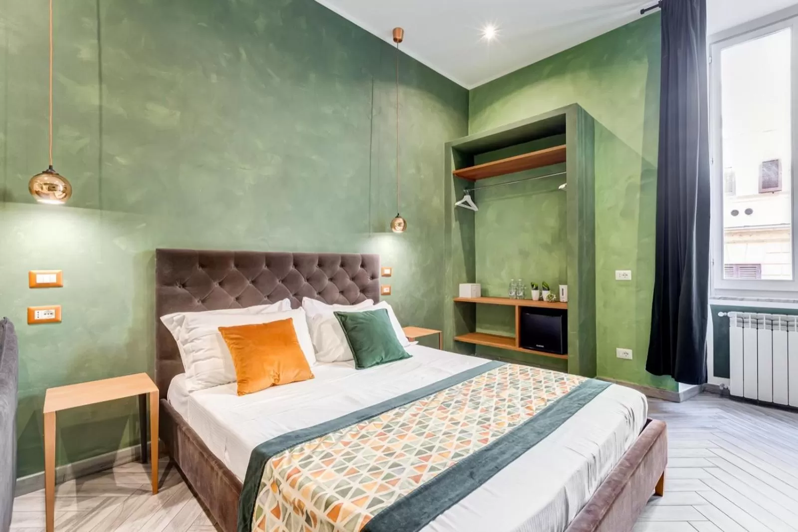 Bed in Ripetta Deluxe Suites