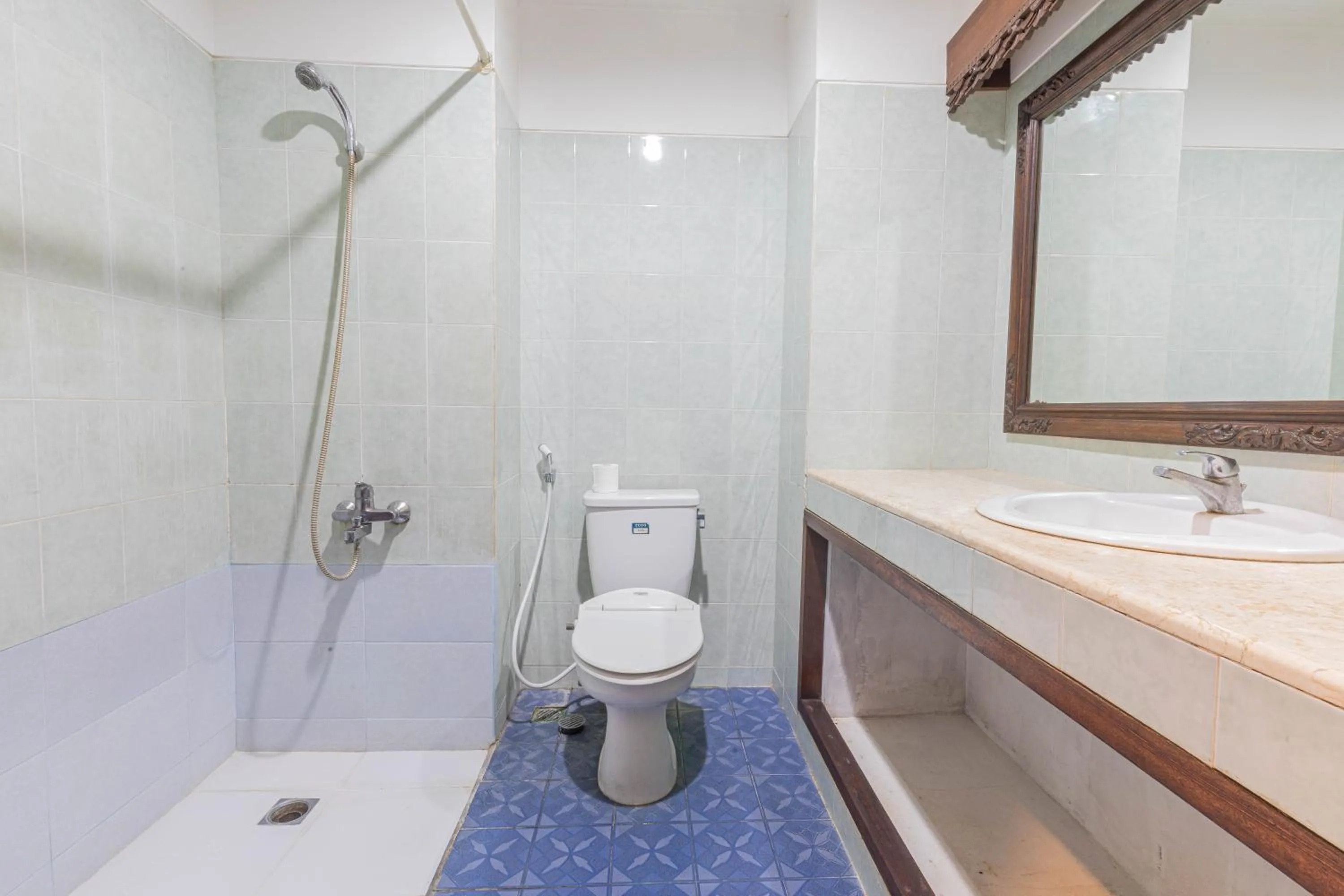 Bathroom in Puri Mango Guest House Sanur