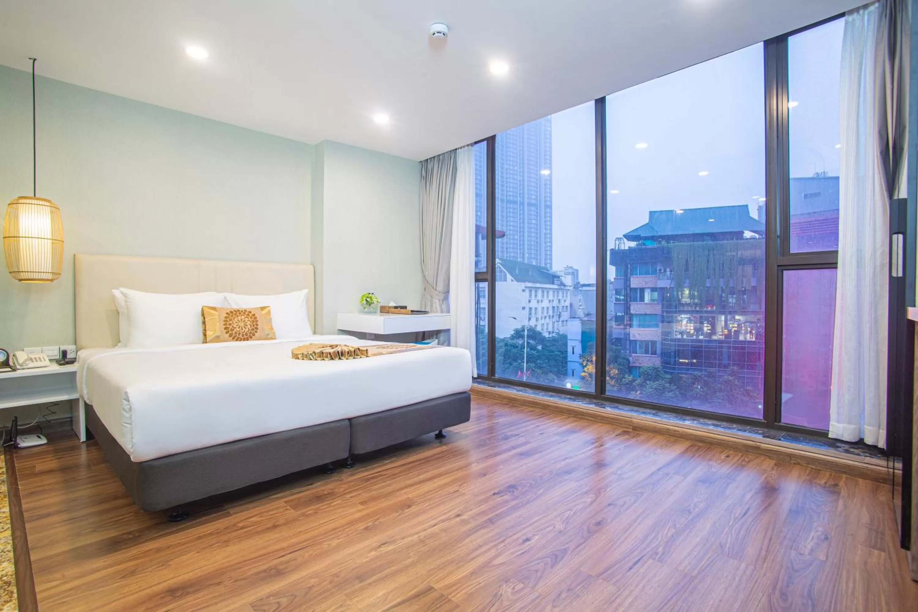 Seating area, Bed in Bridge Lakeside Room For Rent Hanoi