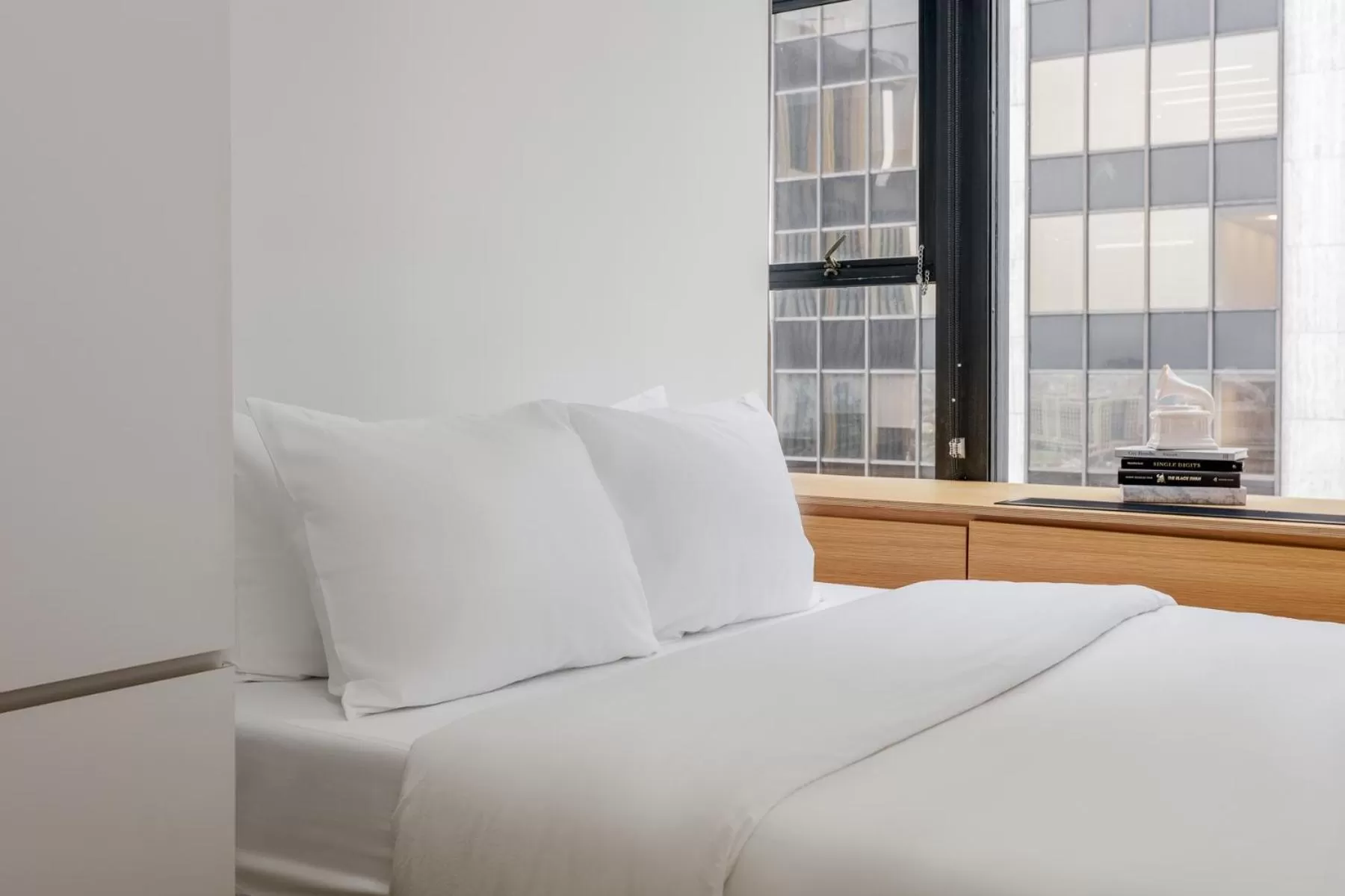 Bed in Placemakr Wall Street