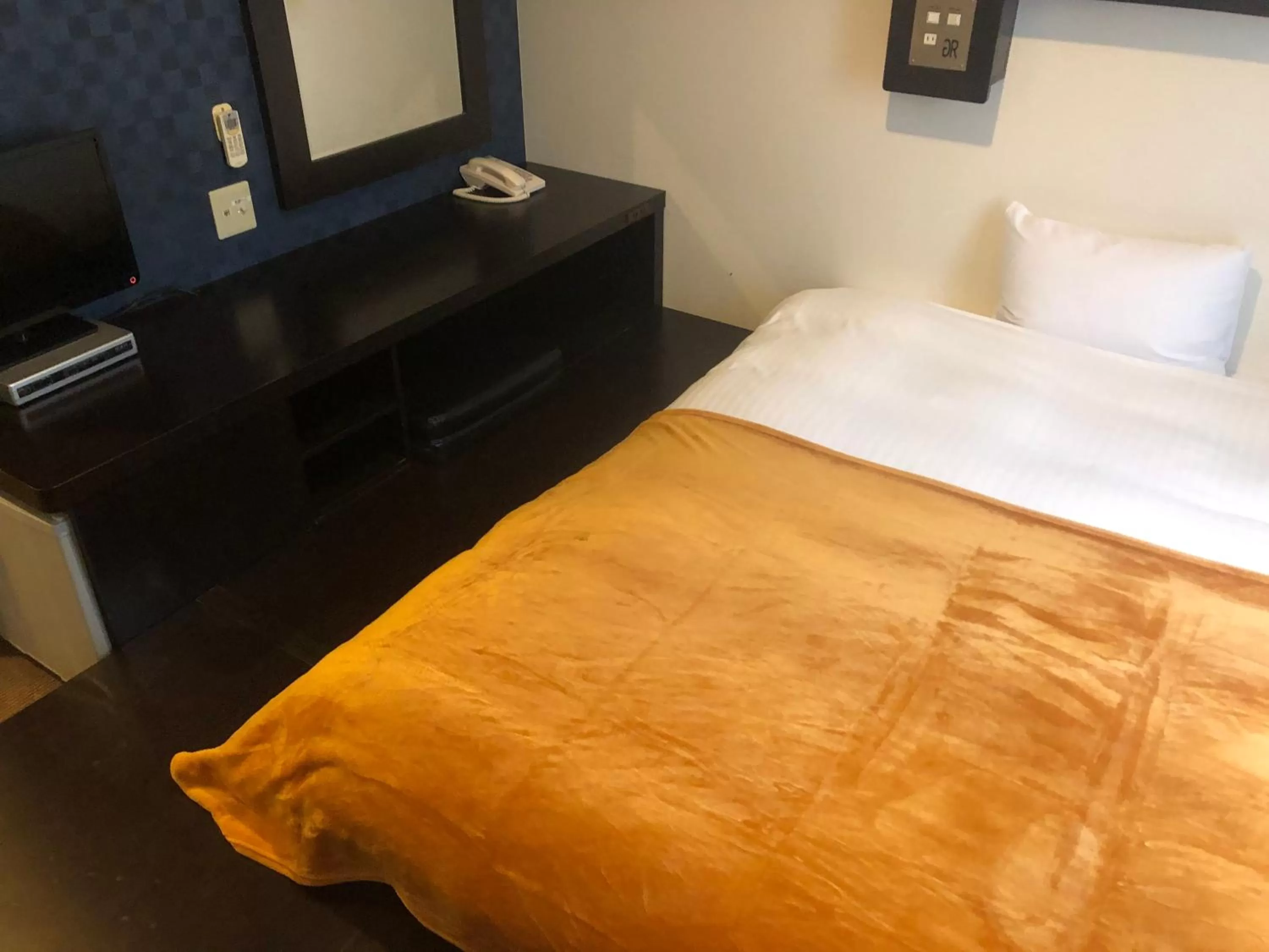 Bed in Green Rich Hotel Hamada Ekimae (Artificial hot spring Futamata Yunohana)