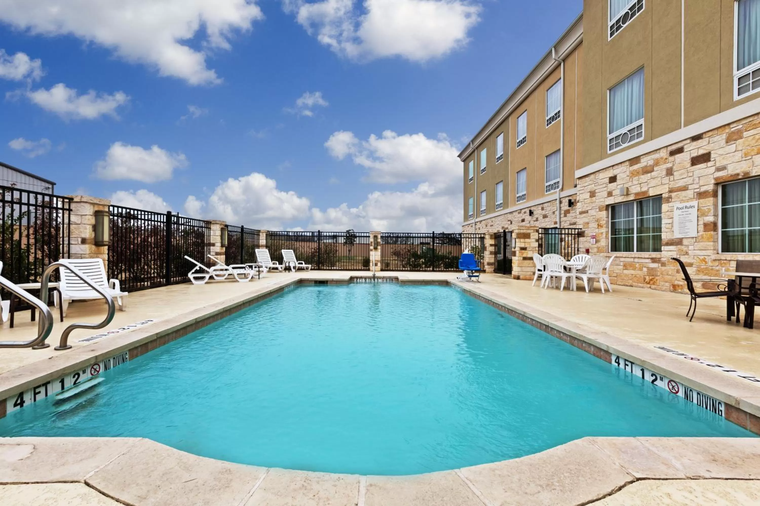 Swimming pool in Holiday Inn Express & Suites Brady by IHG