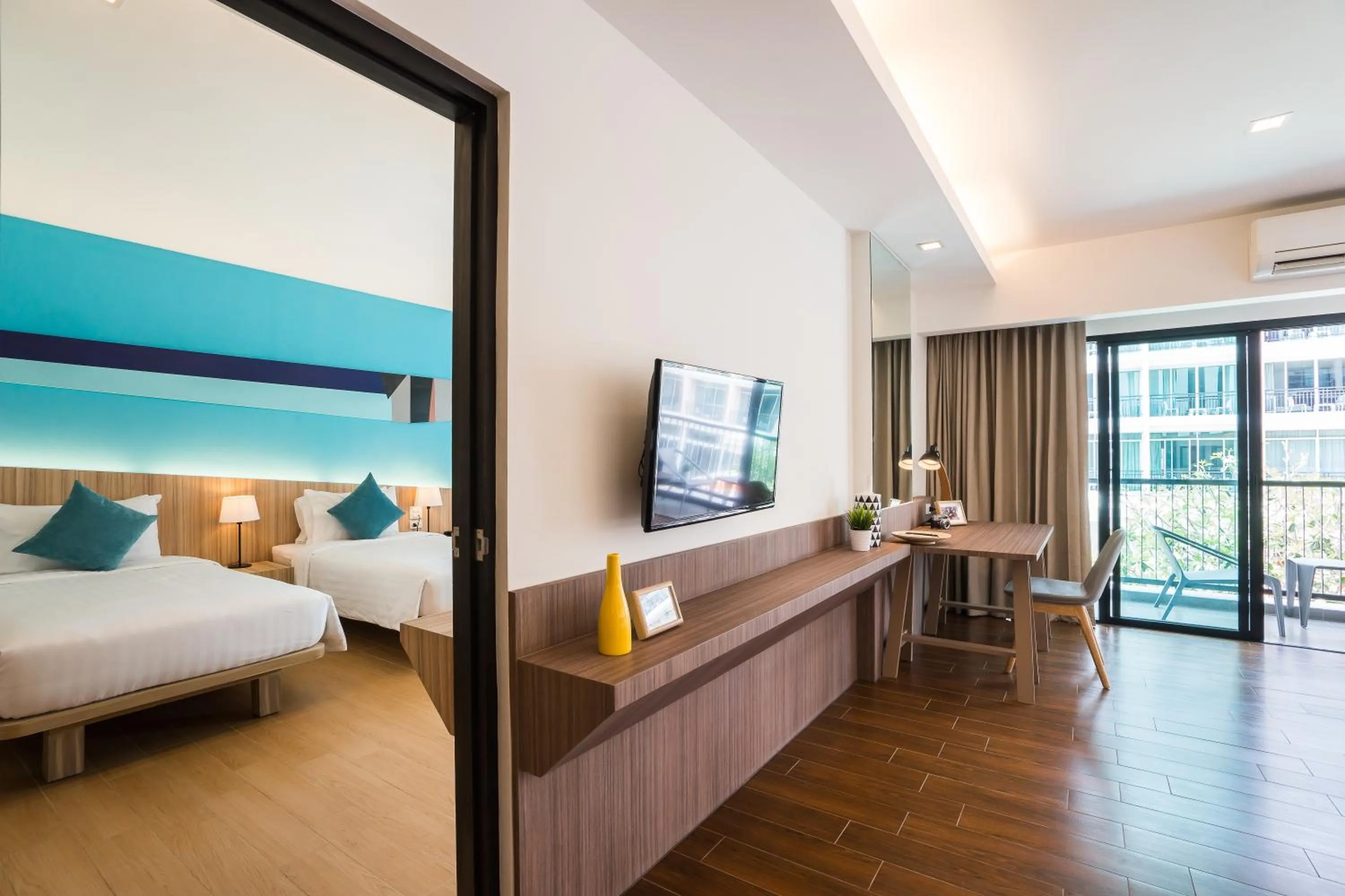 Bed in J Inspired Hotel Pattaya