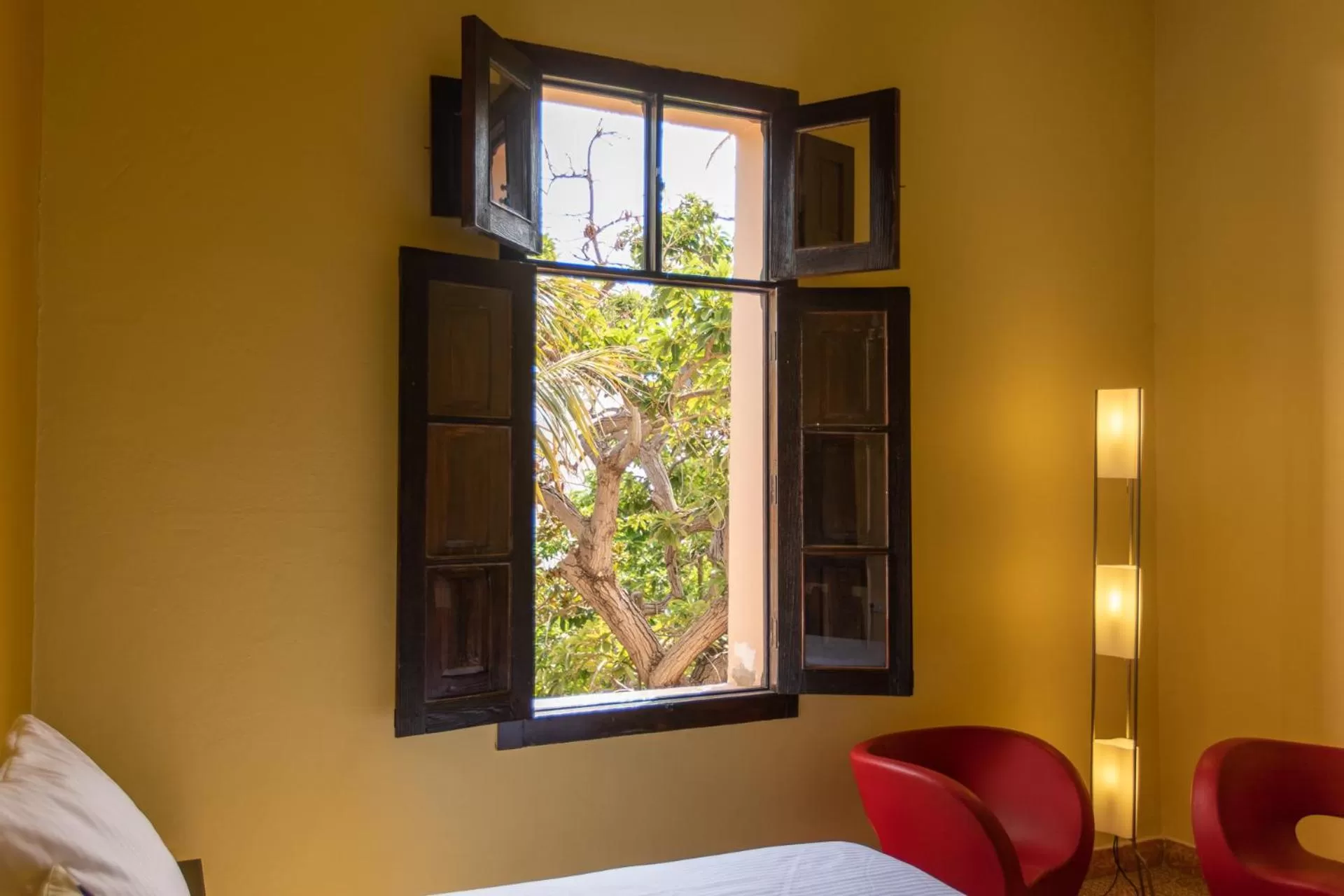 Seating area, Bed in Villa Nestor