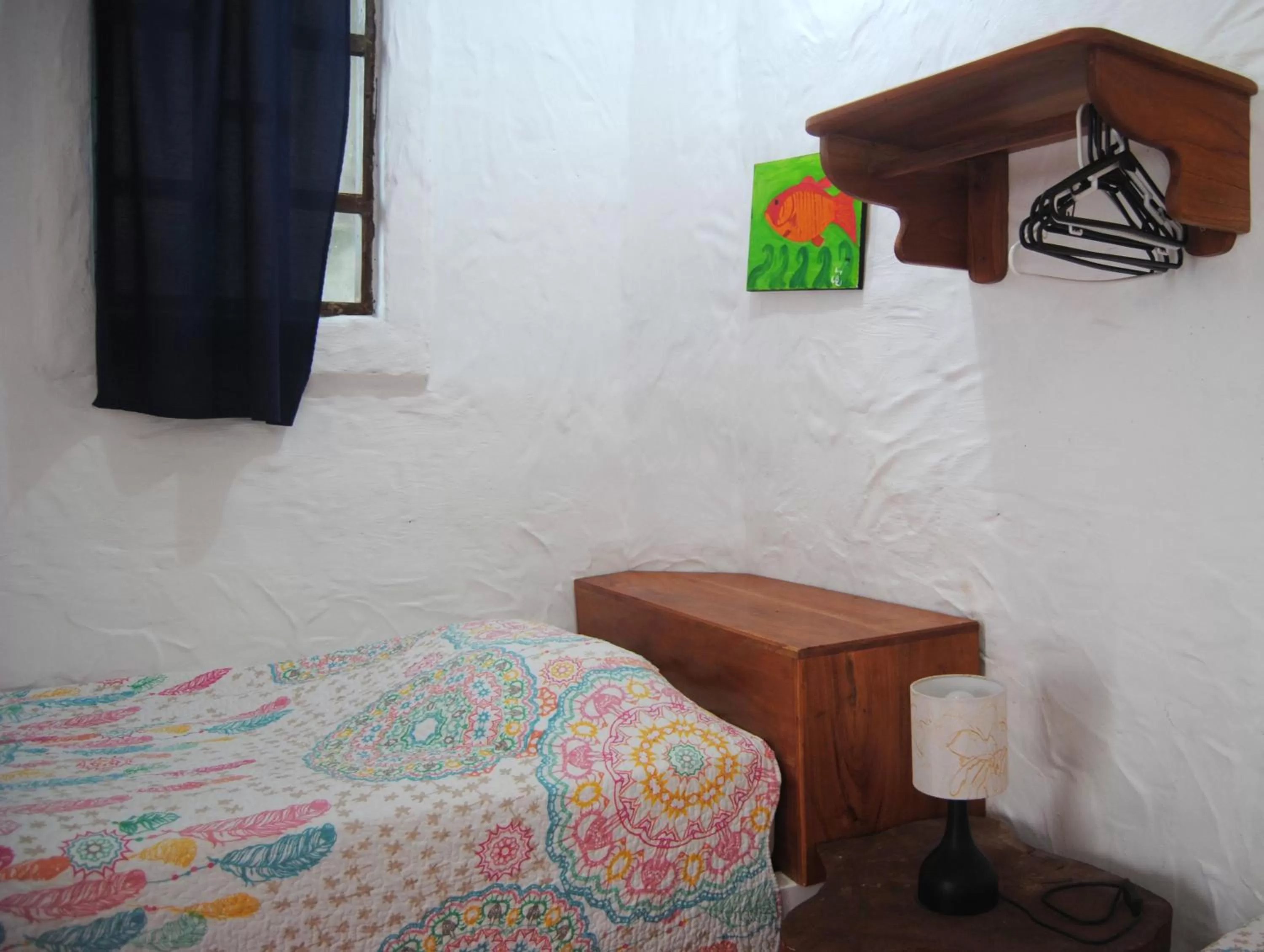 Bed in Hostal Galapagos by Bar de Beto